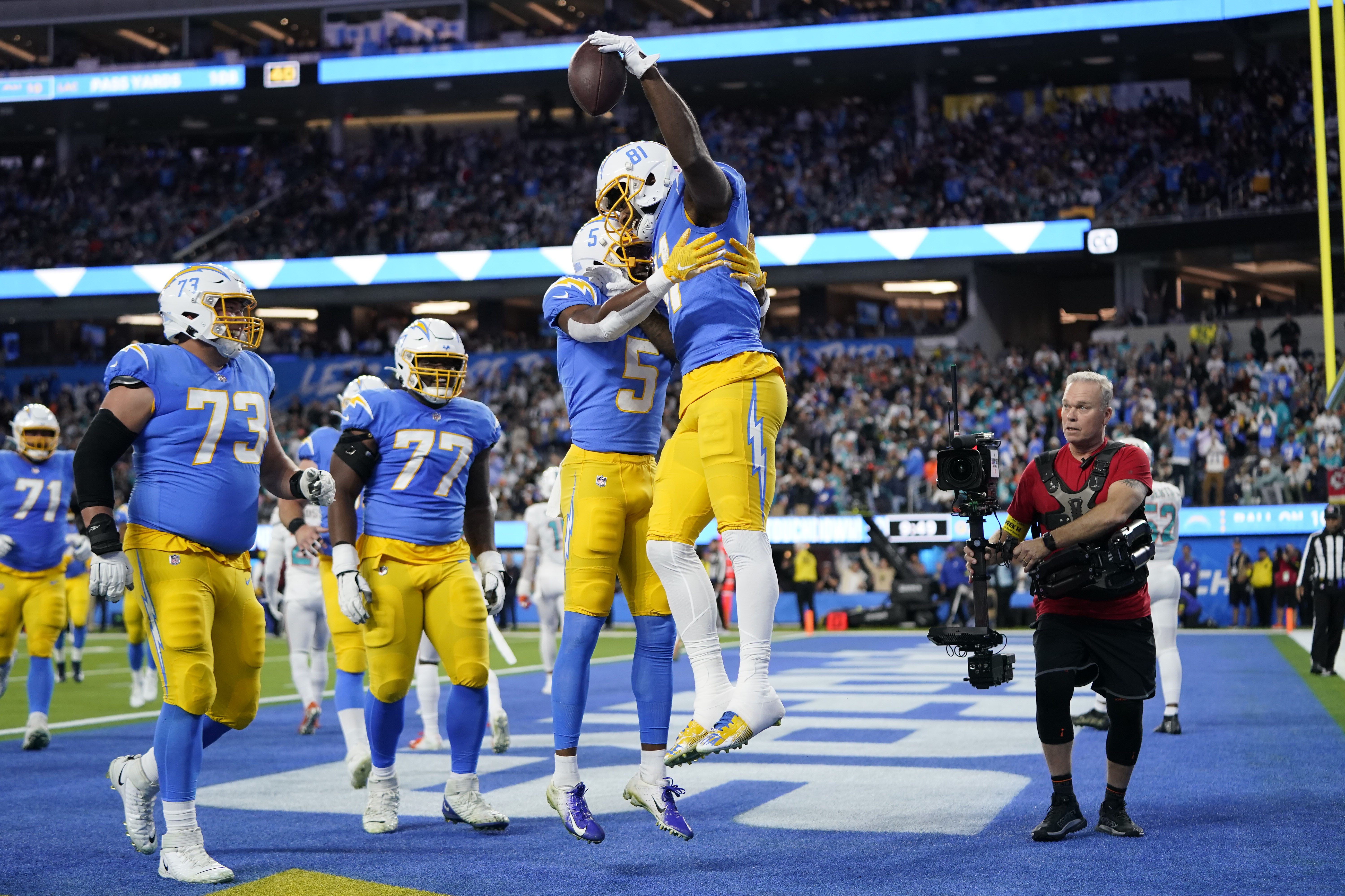 Short-handed Chargers get emotionally charged to beat Dolphins