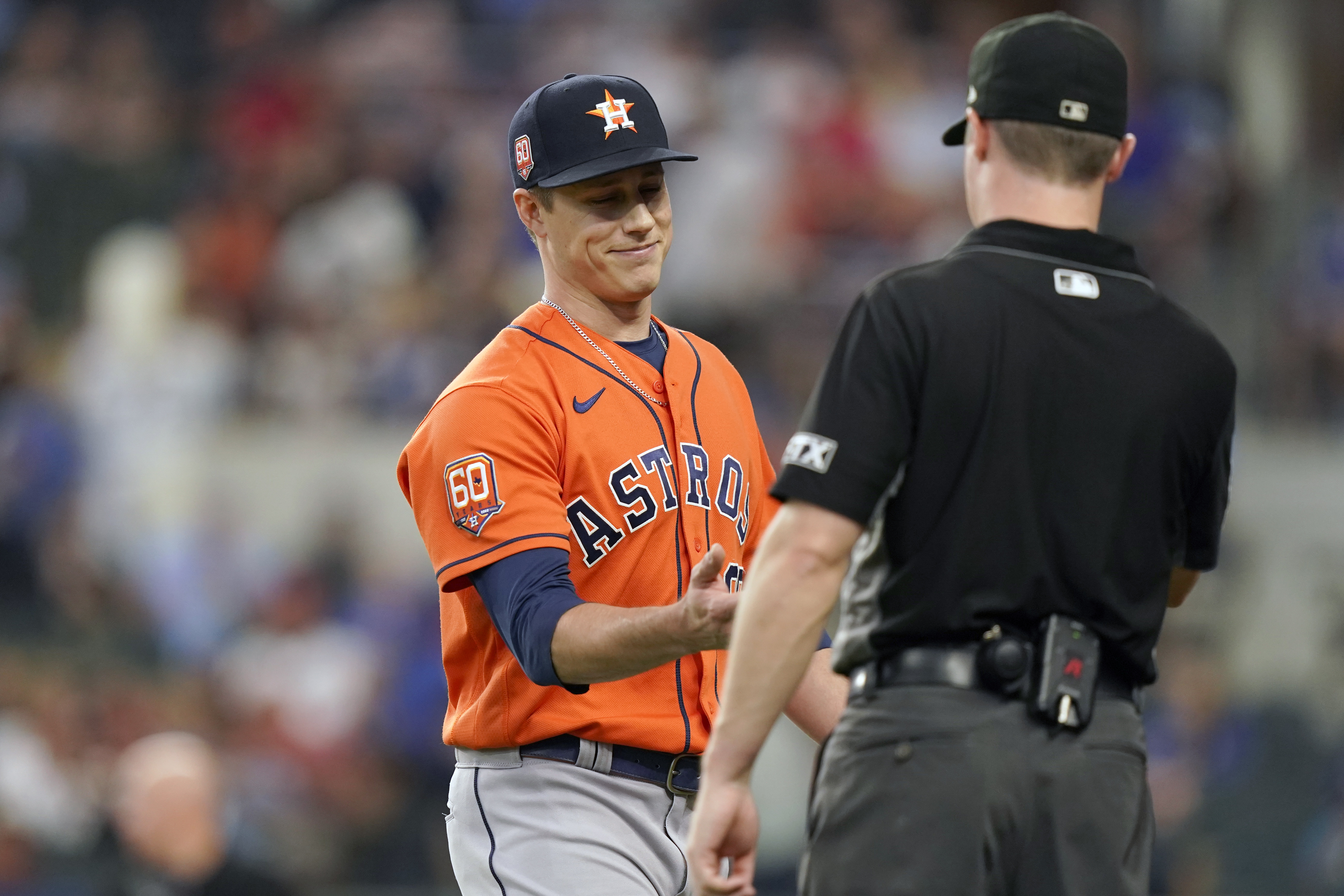 Houston Astros first baseman Yuli Gurriel watches from the dugout during  the first inning of the team's baseball game against the Texas Rangers in  Arlington, Texas, Tuesday, June 14, 2022. (AP Photo/LM