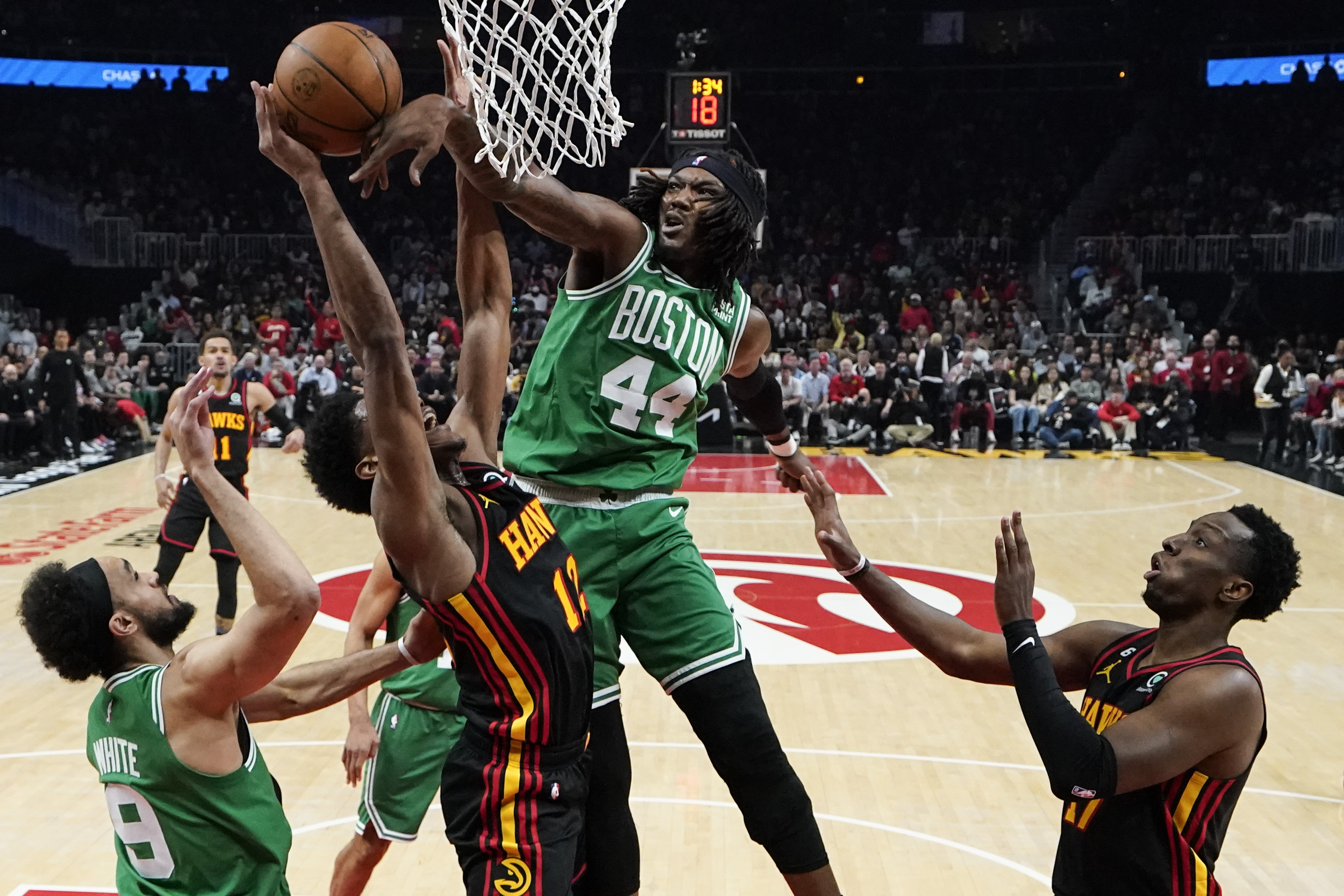 Atlanta Hawks guard Bogdan Bogdanovic (13) shoots the ball against the  Boston Celtics the fourth quarter of game one of the 2023 NBA playoffs at  TD Garden.