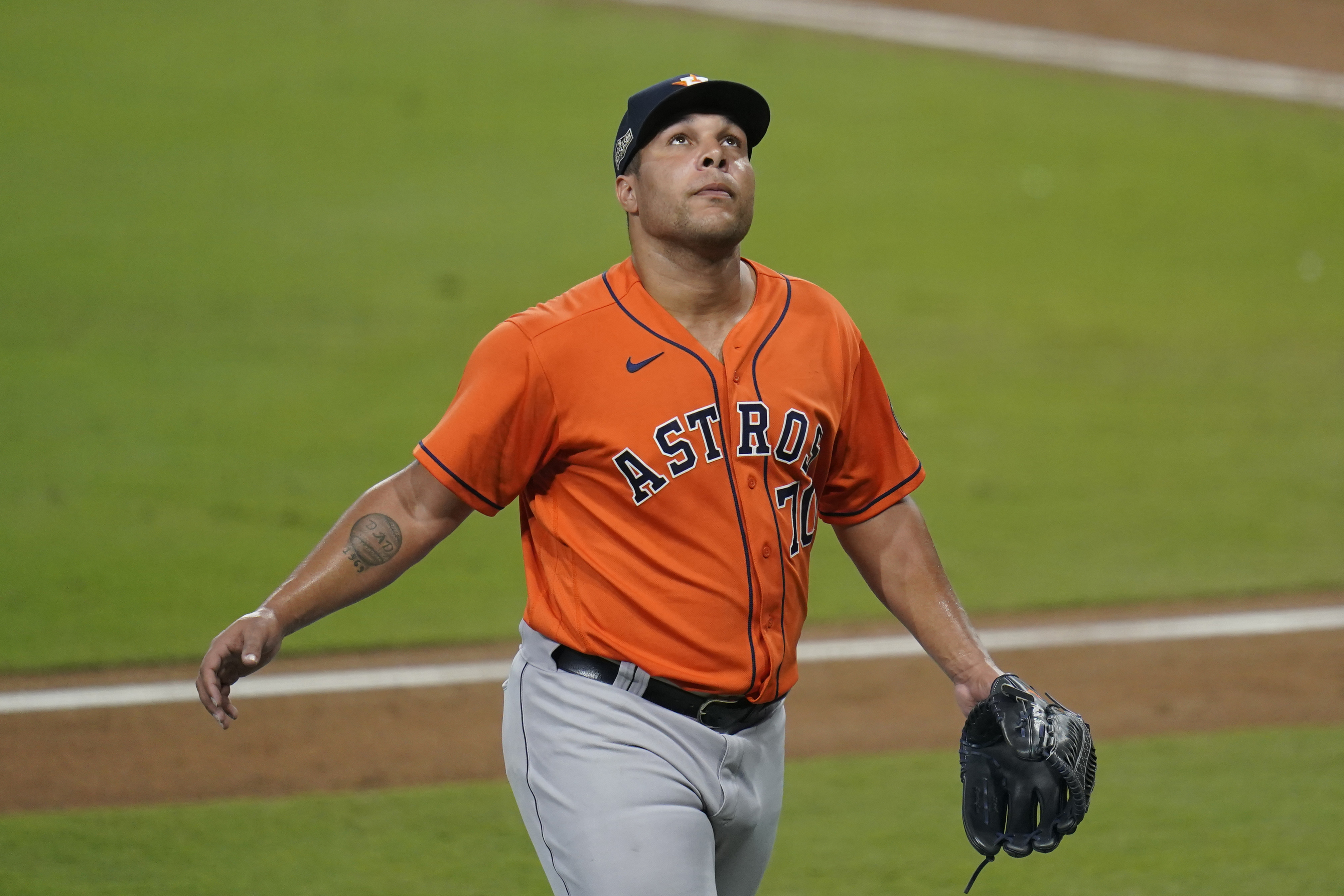 Andre Scrubb of the Houston Astros pitches in the ninth inning News  Photo - Getty Images