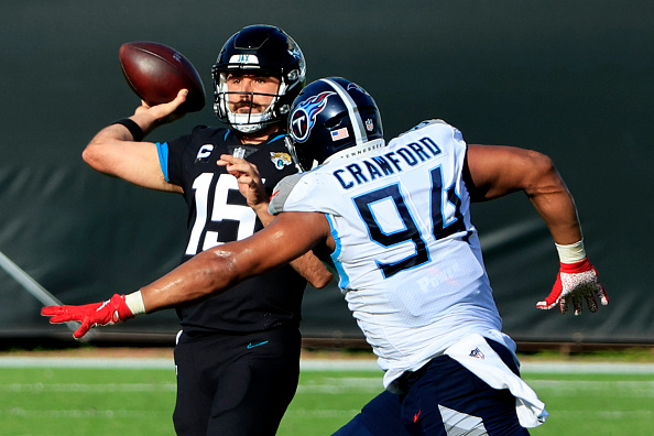 Henry runs for 215 yards, Titans beat Jaguars, 31-10