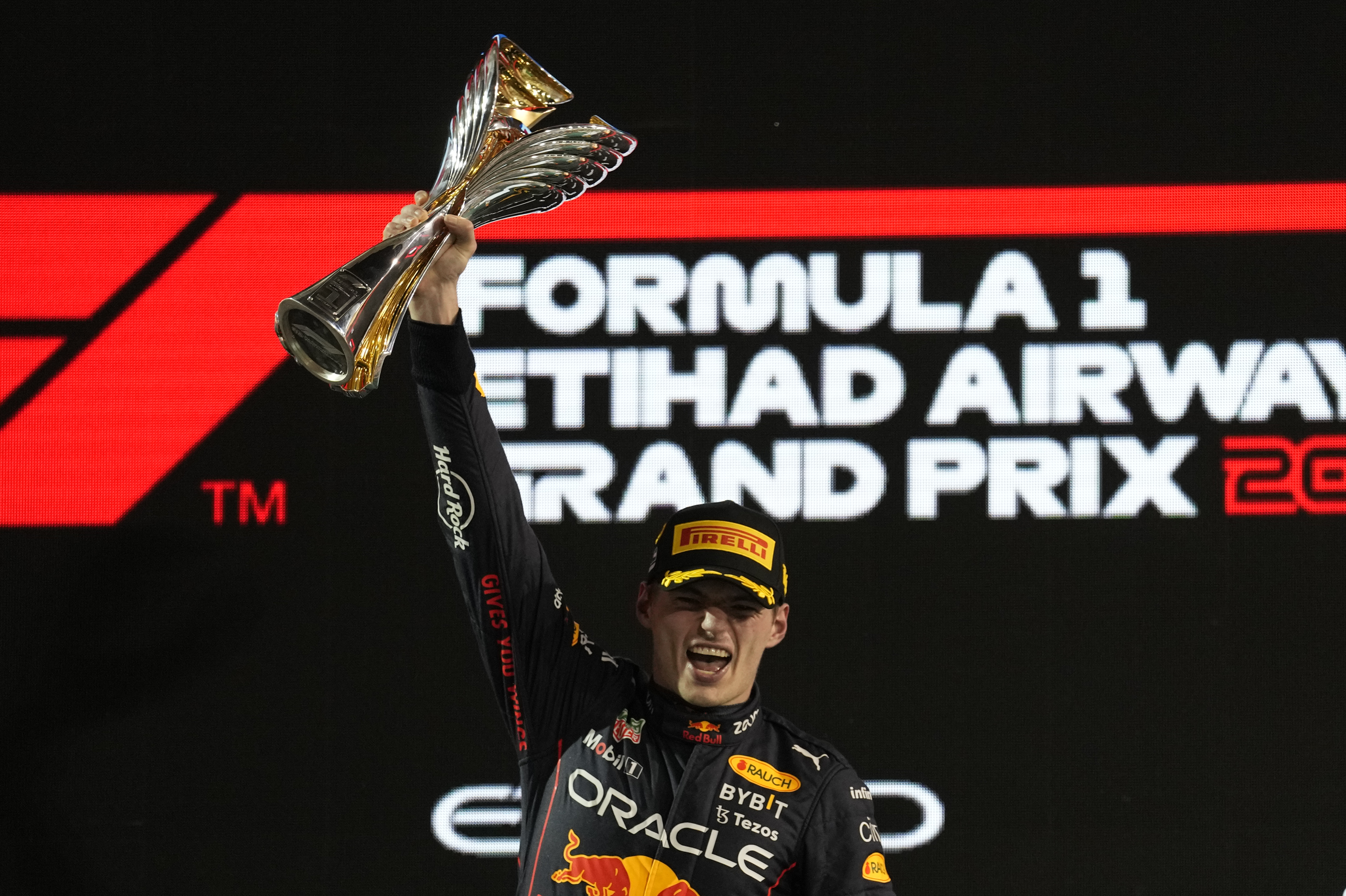 Race winner Charles Leclerc celebrate on the podium with the trophy, Formula  1 photos