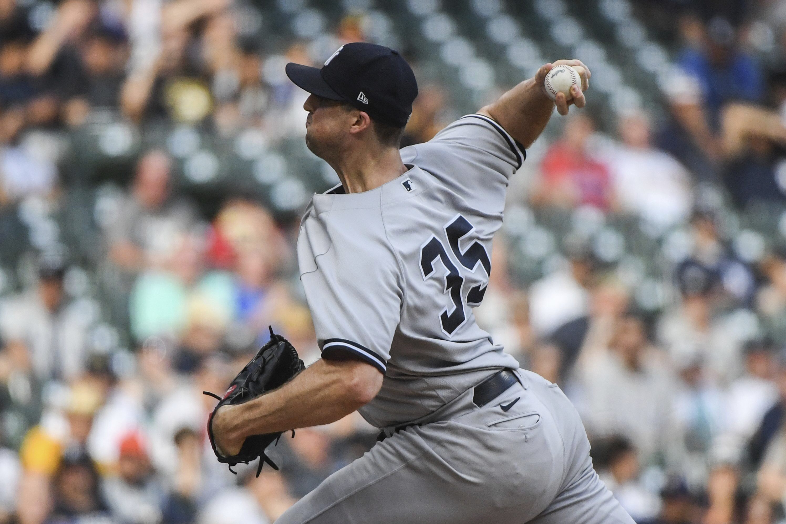 New York Yankees' Aaron Judge talks with Milwaukee Brewers' Rowdy