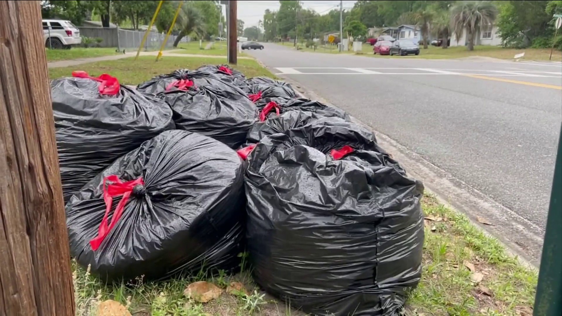 Premium Photo  Heap of plastic trash bags on curb waiting for