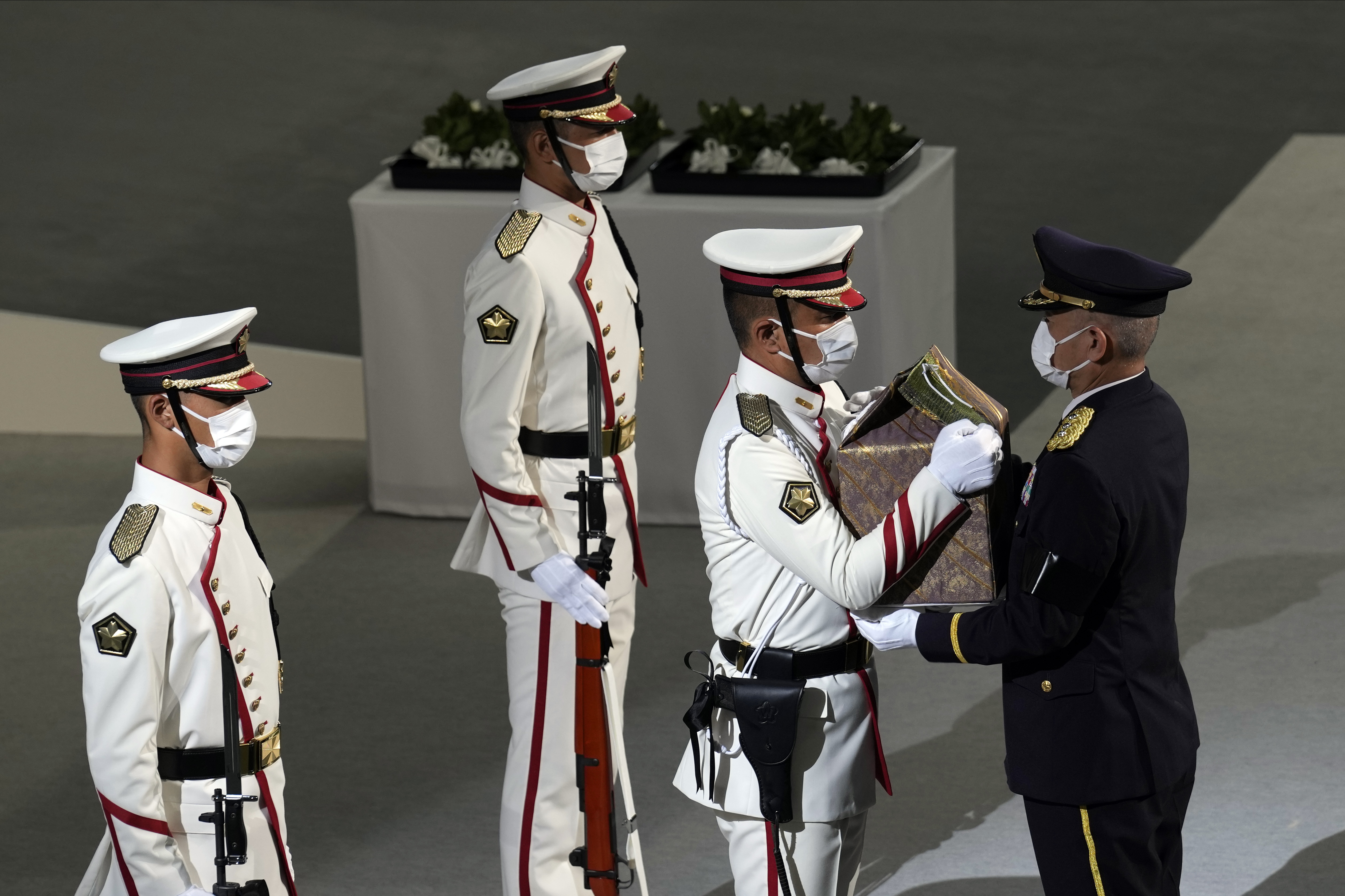 Japanese former leader Abe honored at divisive state funeral