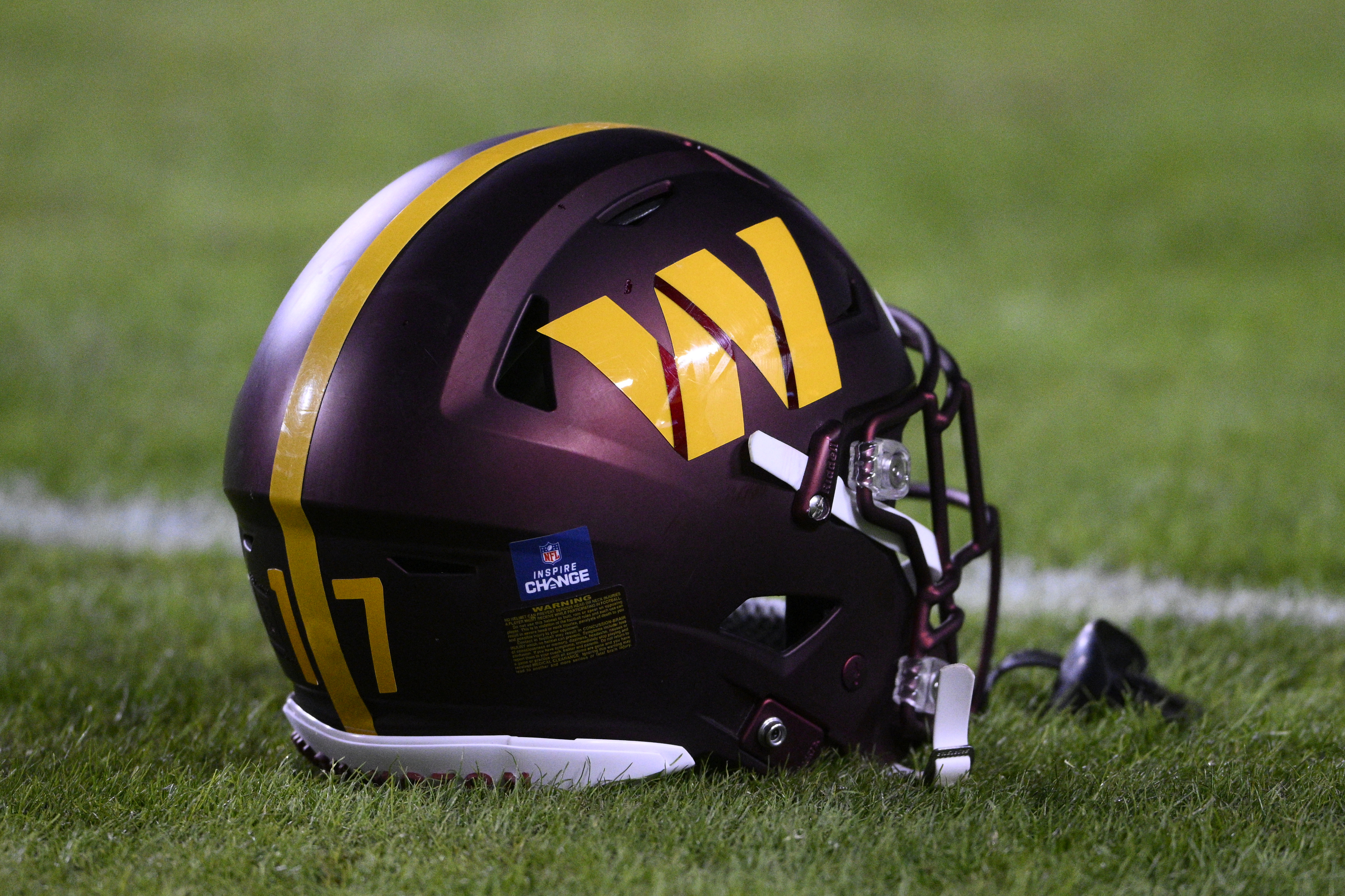 The Washington Commanders logo is seen in the end zone before a NFL  football game between the Washington Commanders and the Jacksonville  Jaguars, Sunday, Sept. 11, 2022, in Landover, Md. (AP Photo/Nick