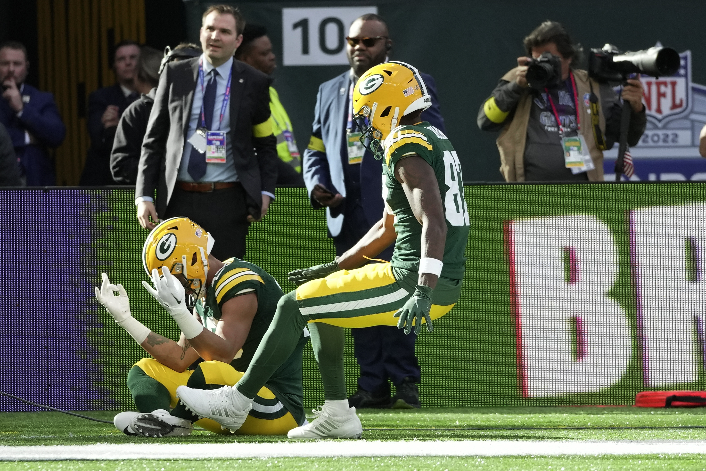 Aaron Rodgers of the Green Bay Packers is sacked by Oshane Ximines