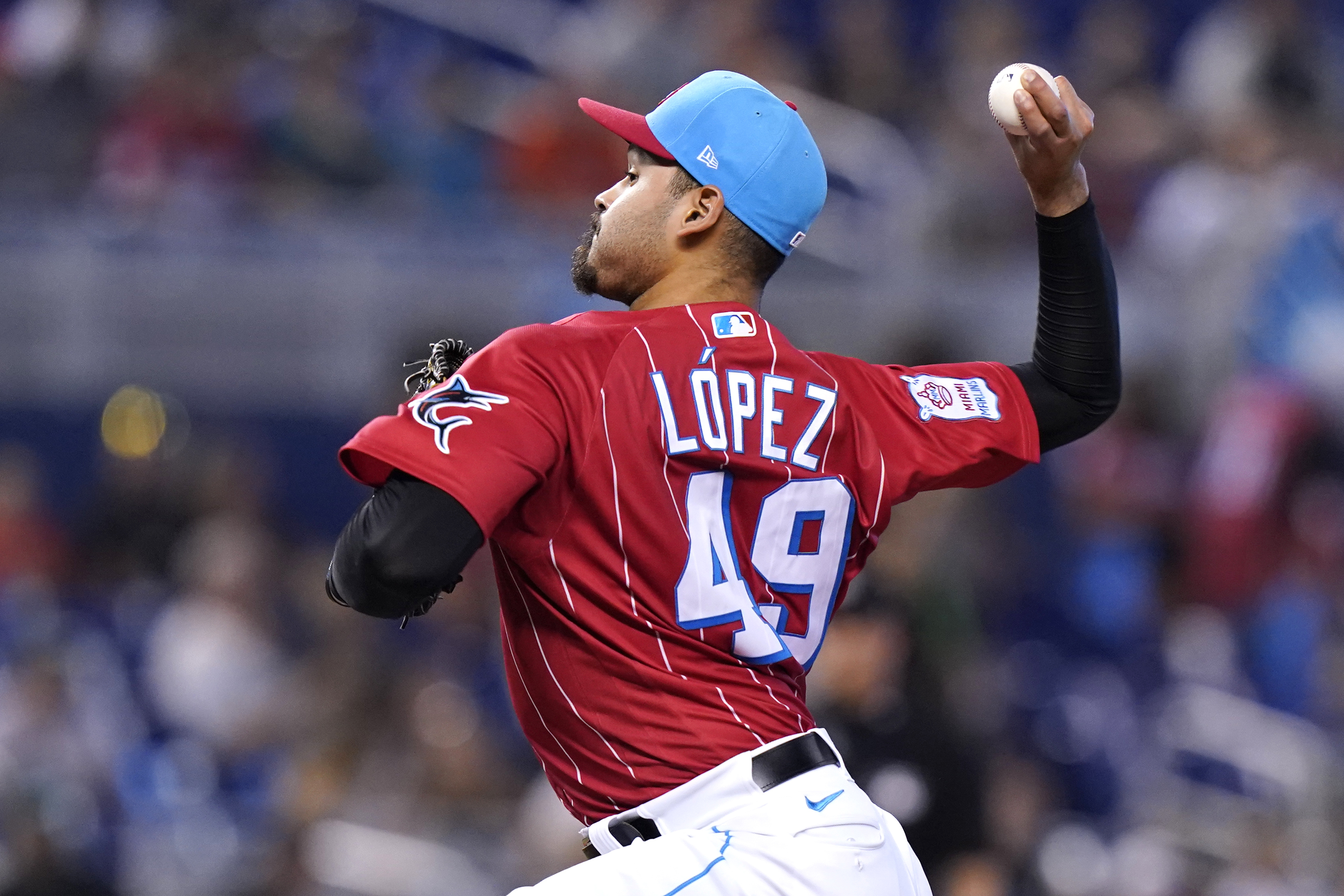 Marlins' López sets MLB mark with 9 strikeouts to open game