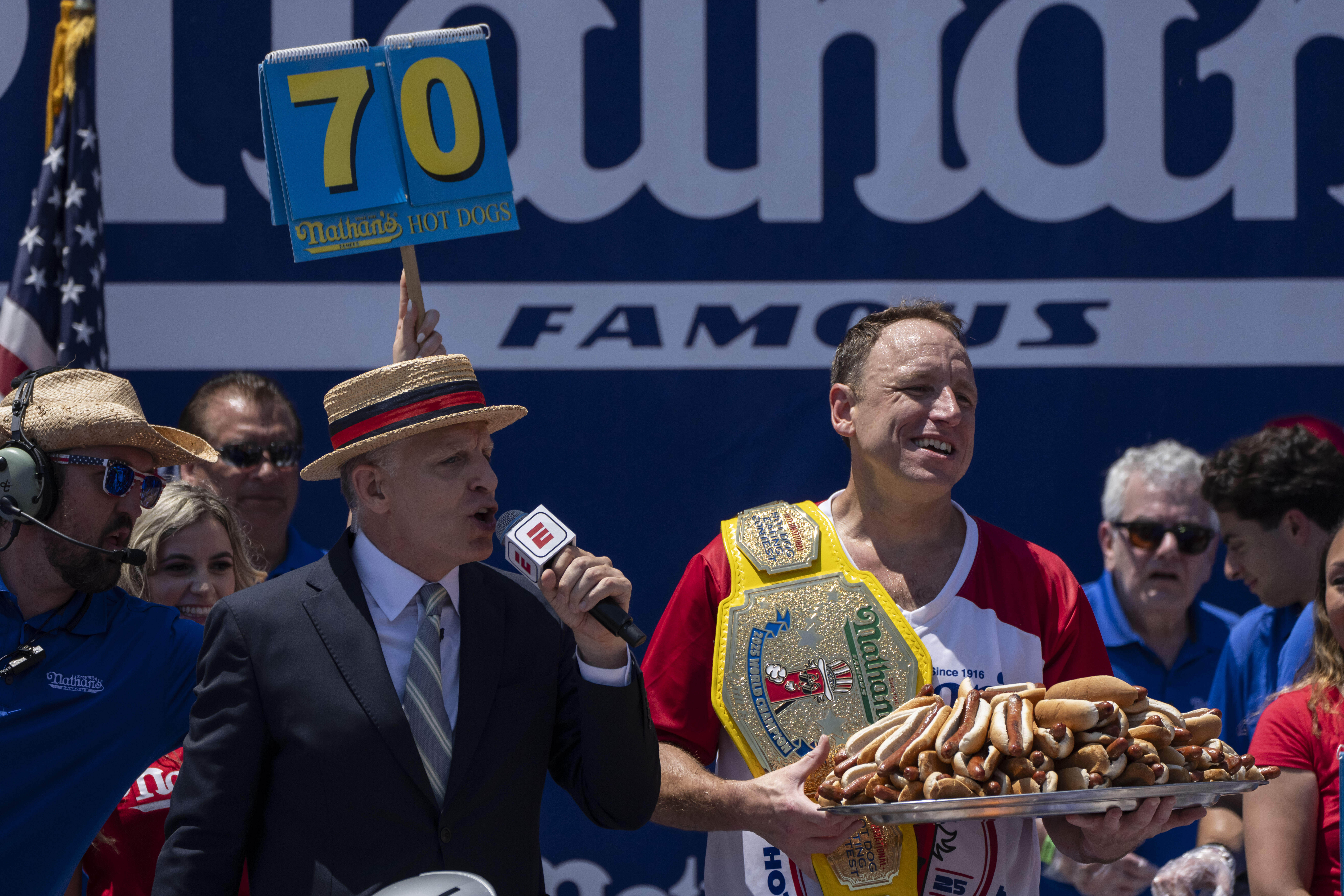 Joey Chestnut reclaims title in Nathan's Famous hot dog eating