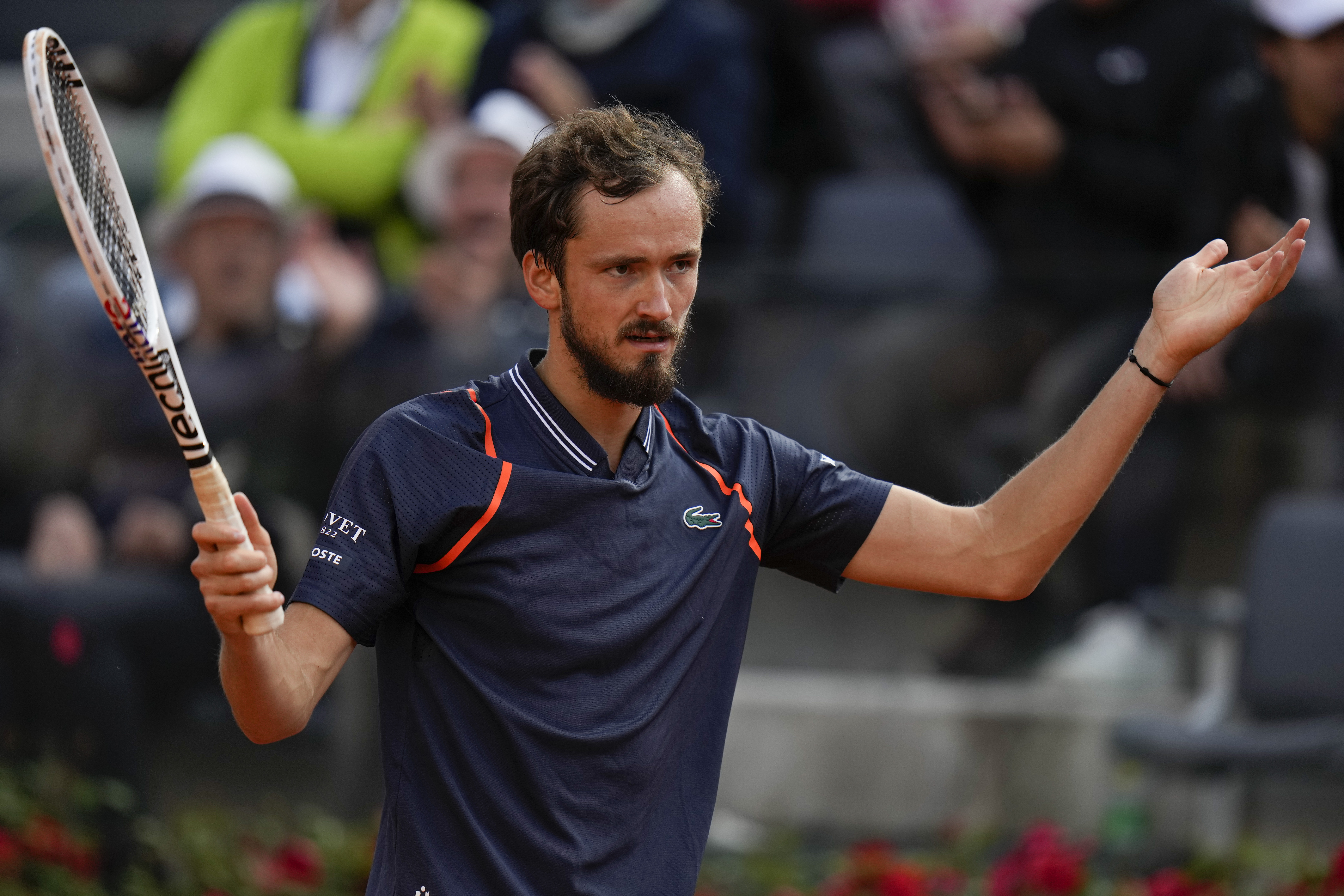 Medvedev makes his mark on clay by beating Rune for Italian Open title