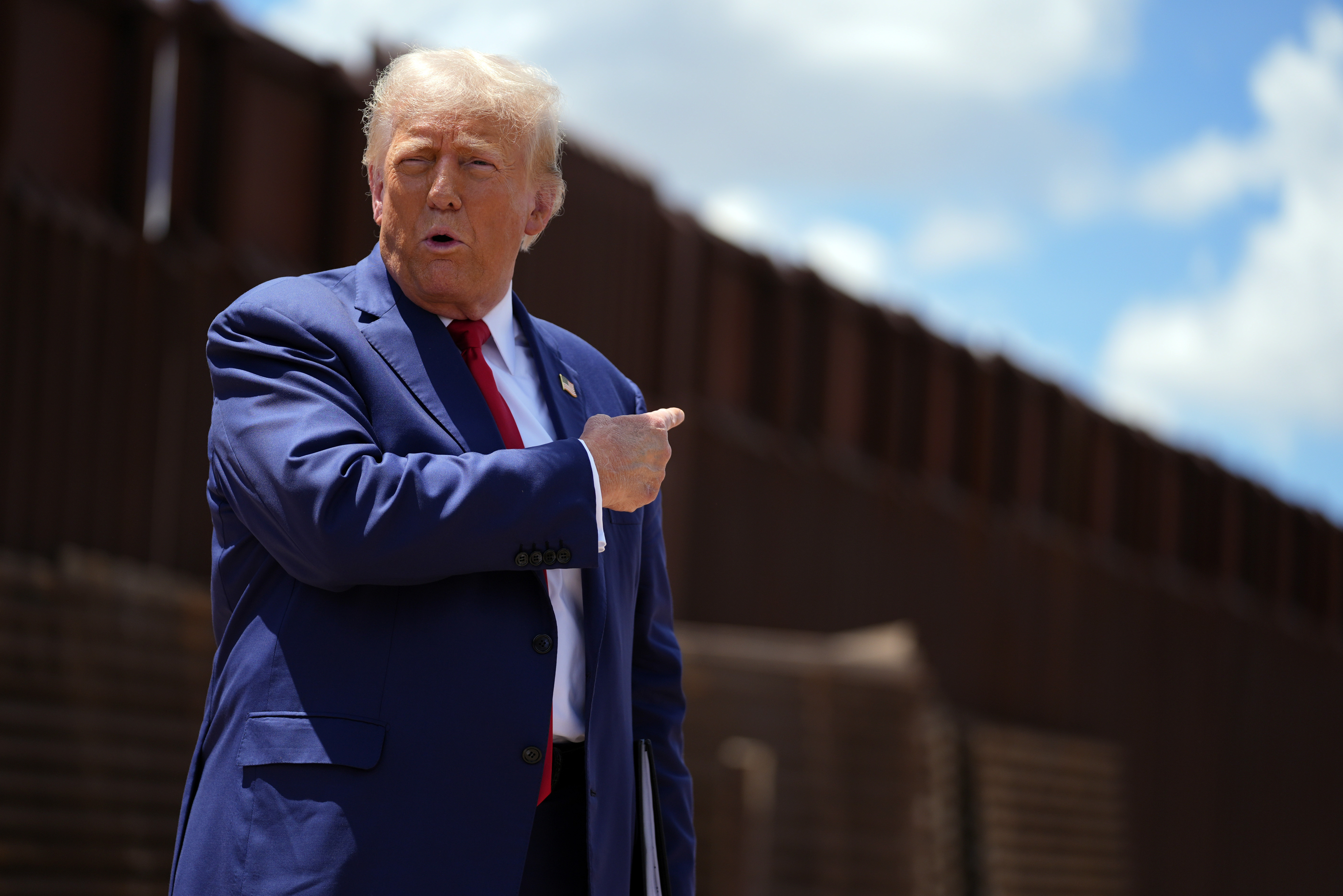 Trump invokes 18th century law to speed deportations, judge stalls
