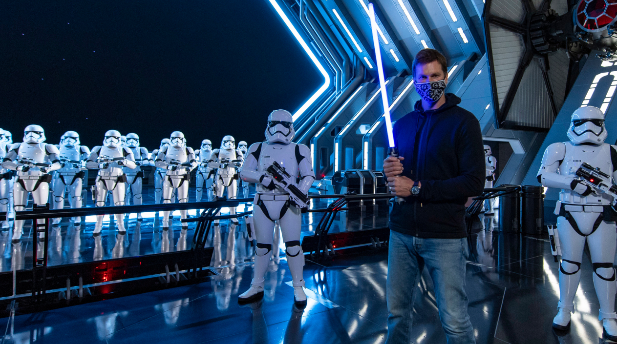 Super Bowl MVP Tom Brady trades football for lightsaber at Walt