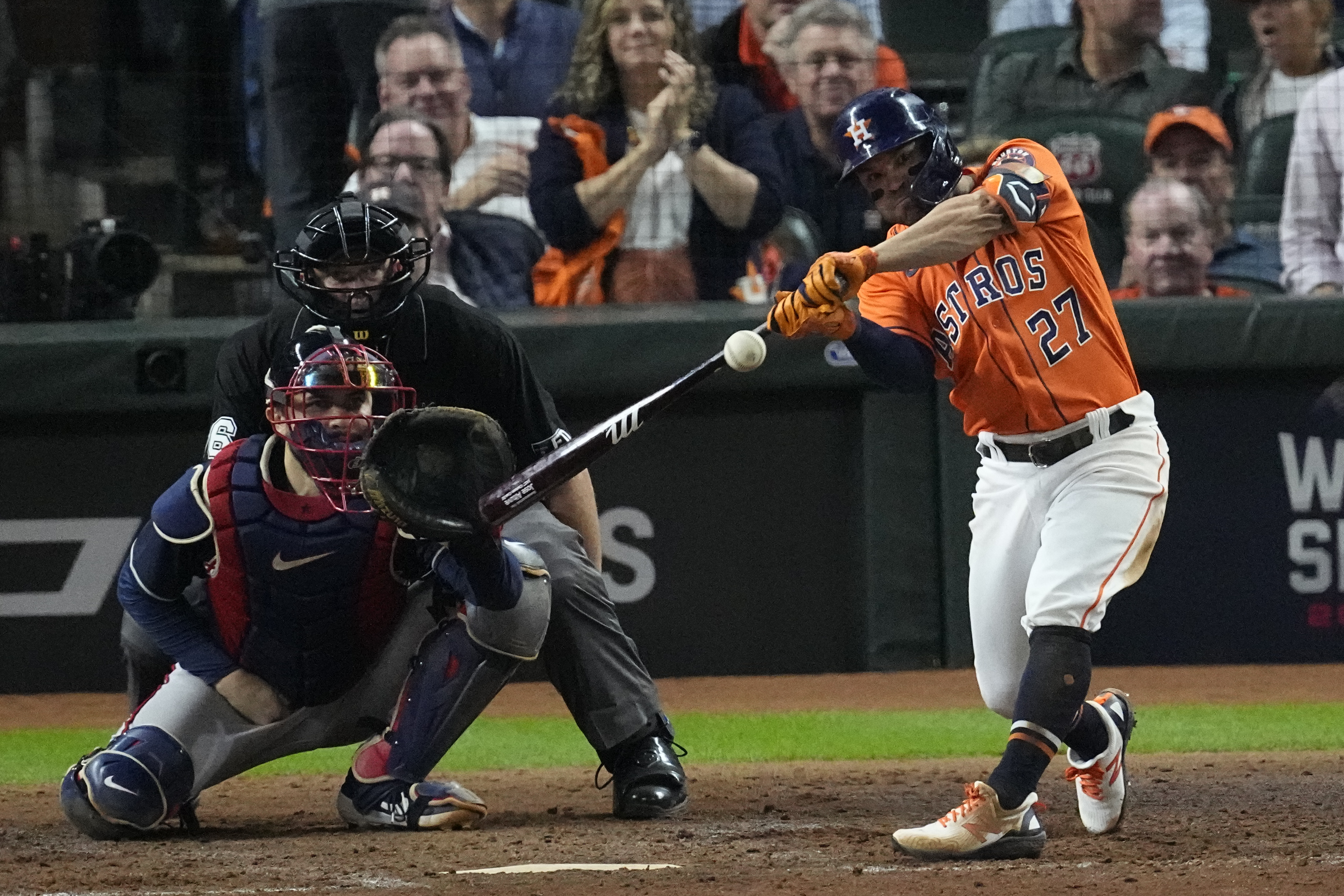 Rookie propels Astros past Braves to tie World Series