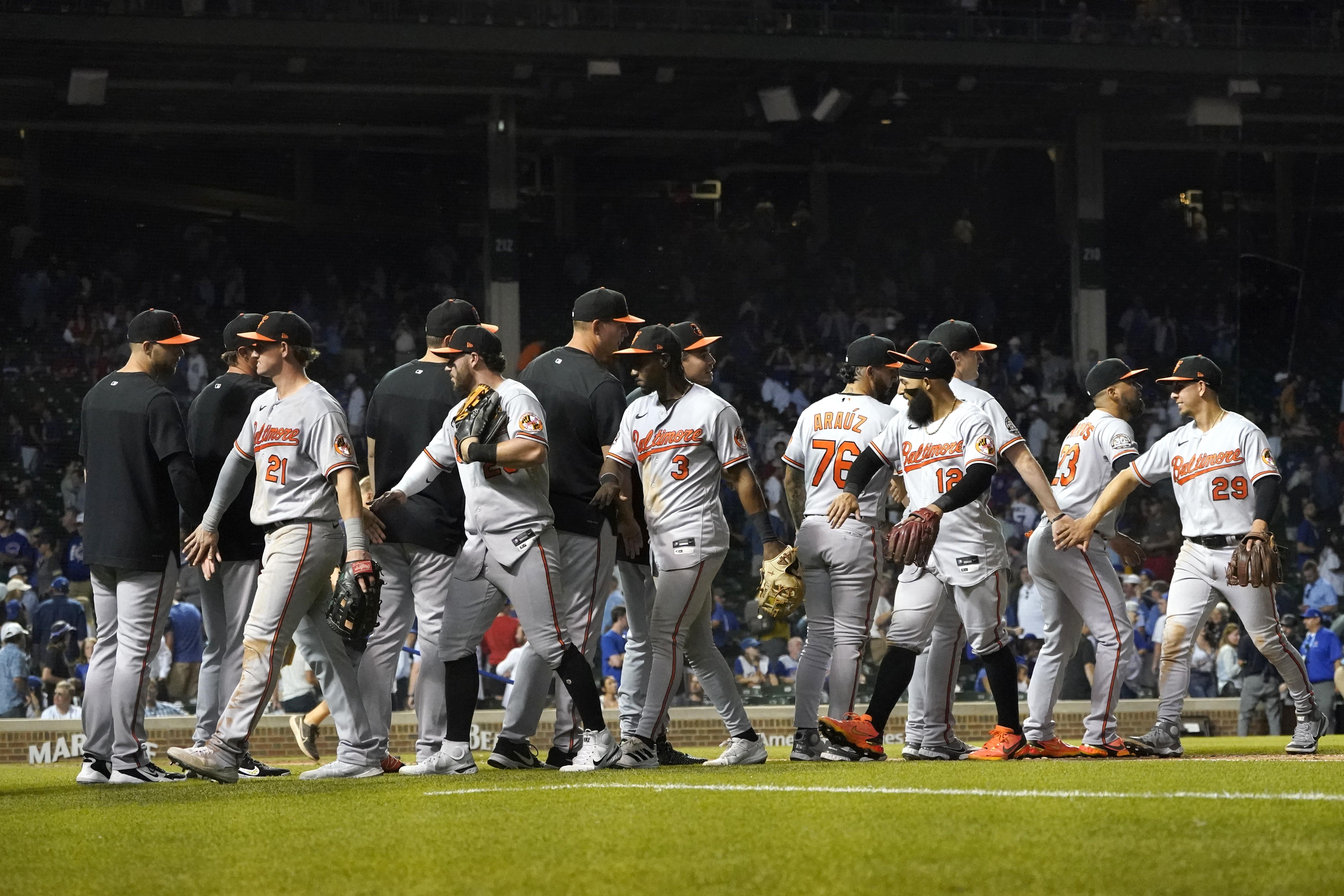 Orioles pitchers Grayson Rodriguez (85), Spenser Watkins (52) and