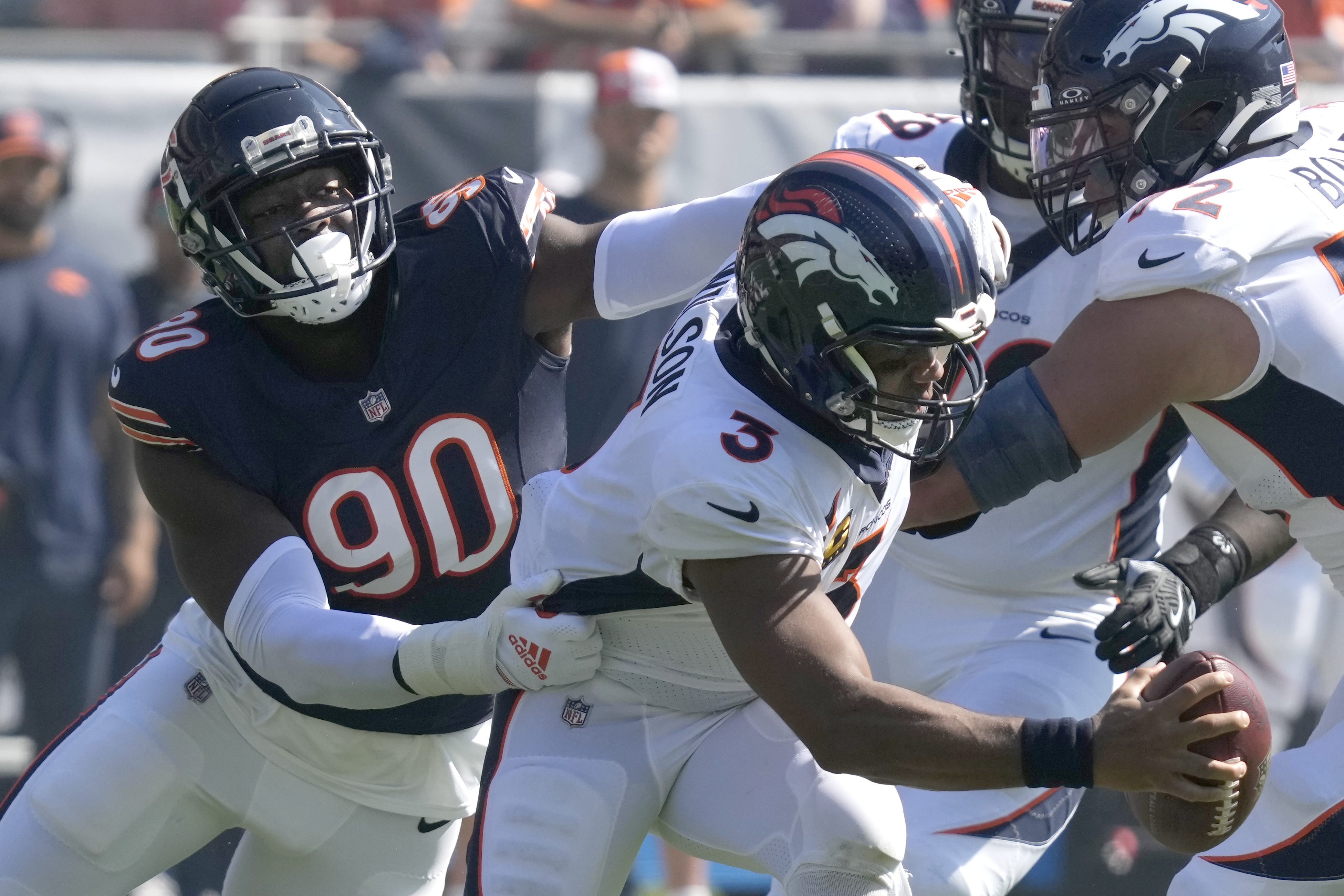 Russell Wilson throws 3 TDs, Broncos rally from 21 down to top Bears 31-28  