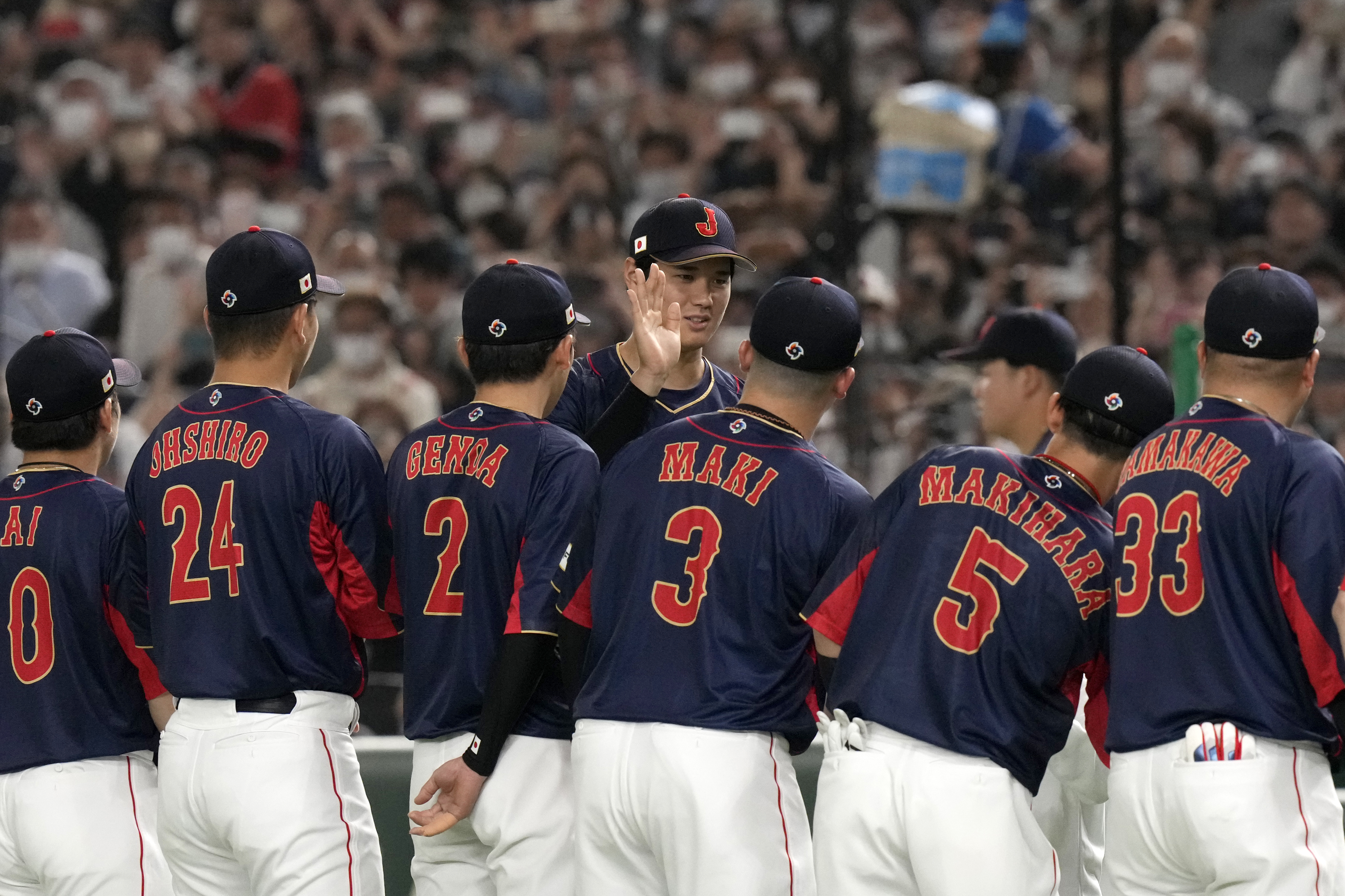 Ohtani's long HR powers Japan to group win at WBC