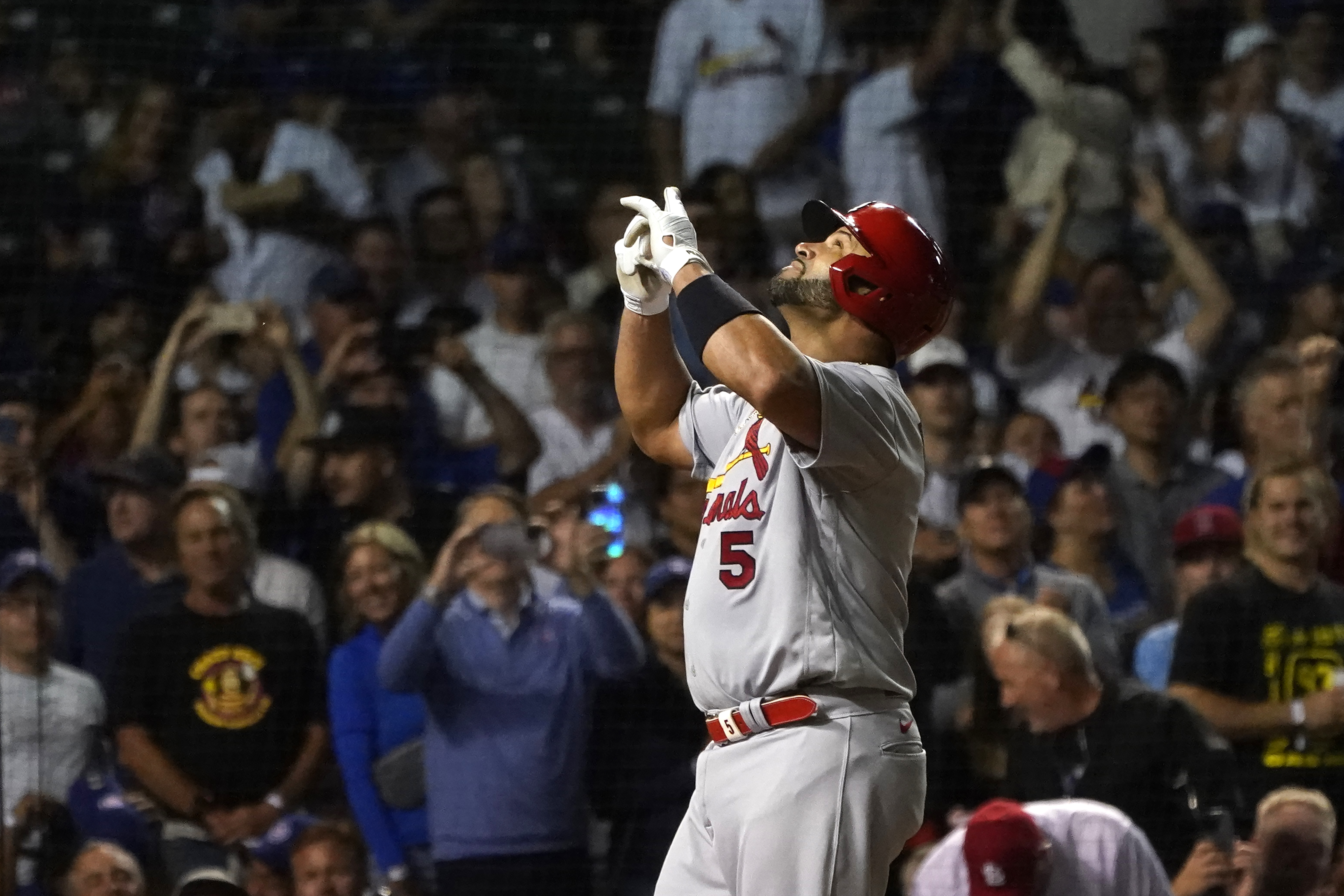 Albert Pujols gives young fan his Cardinals jersey after Cubs game