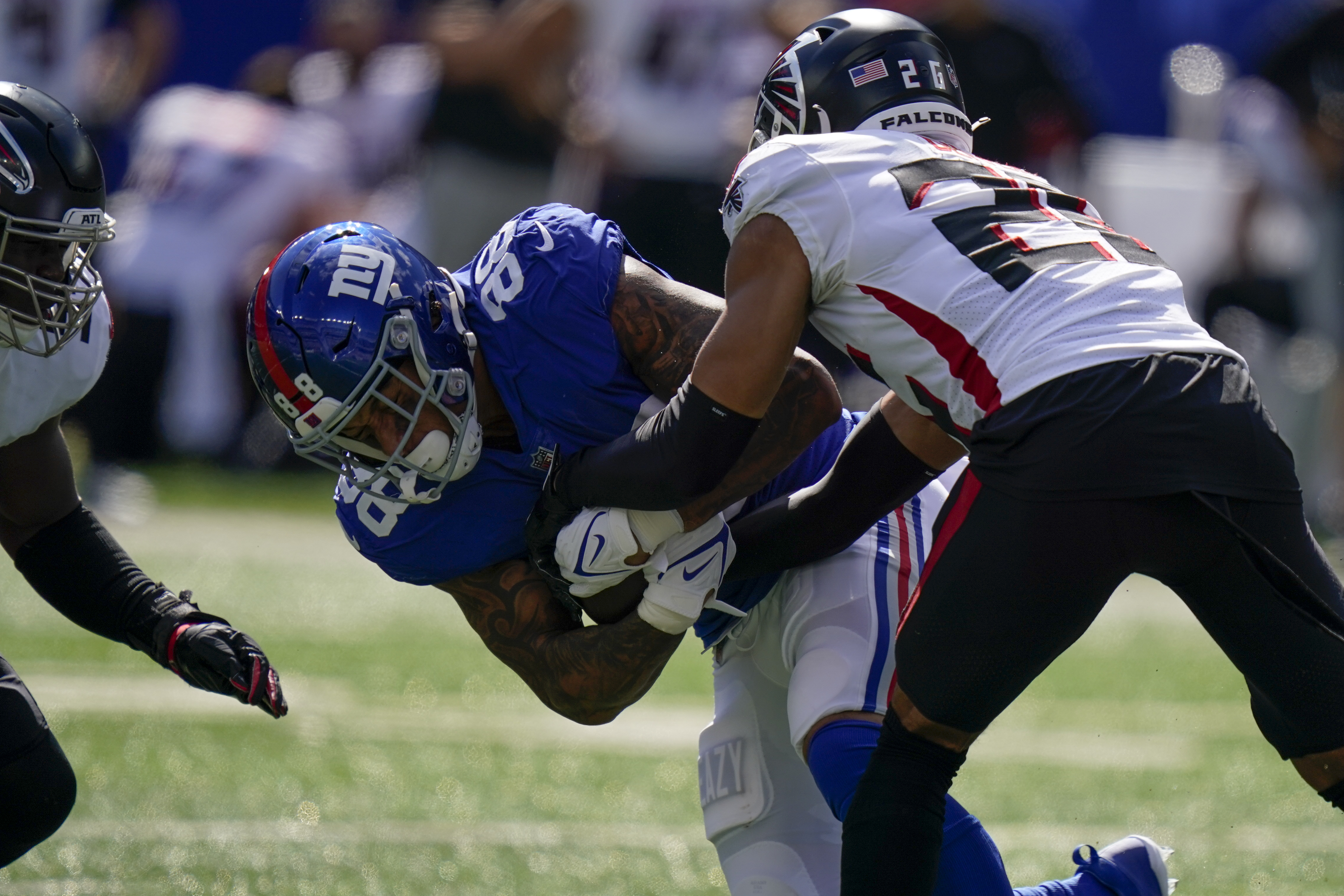 Atlanta Falcons wide receiver Olamide Zaccheaus, right, catches a touchdown  pass during the first half of an NFL football game against the New York  Giants, Sunday, Sept. 26, 2021, in East Rutherford