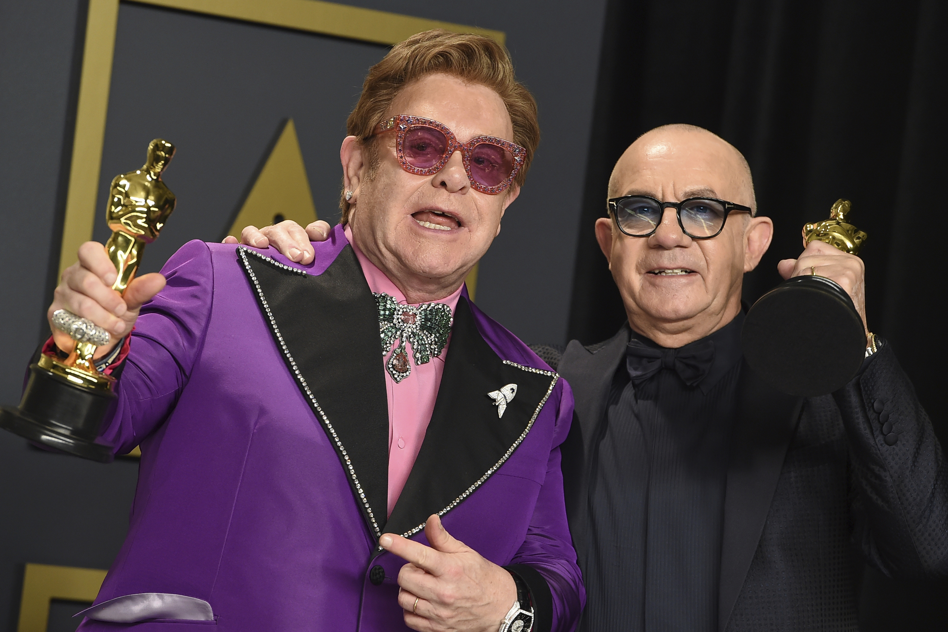 Elton John's fashion through the years - ABC News