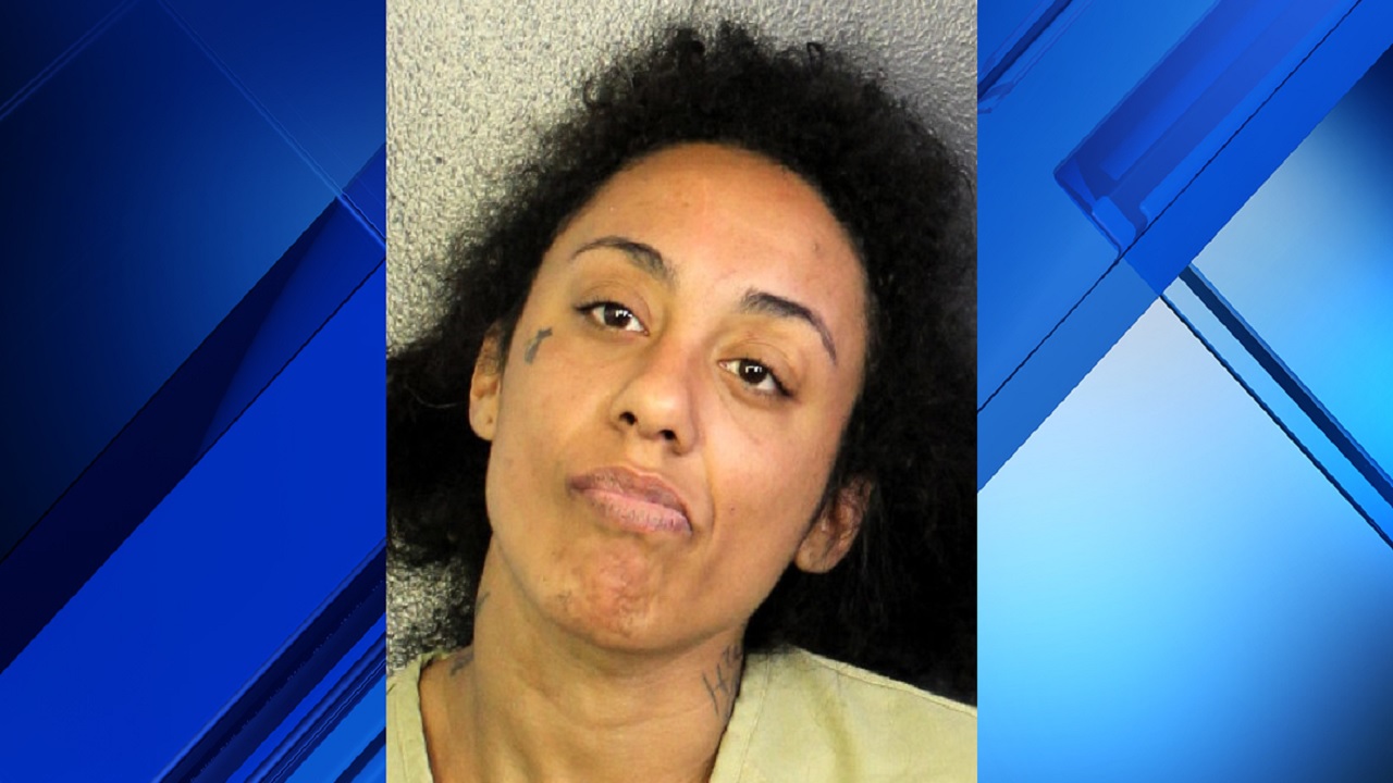 Woman arrested after man found dead in Tamarac home photo