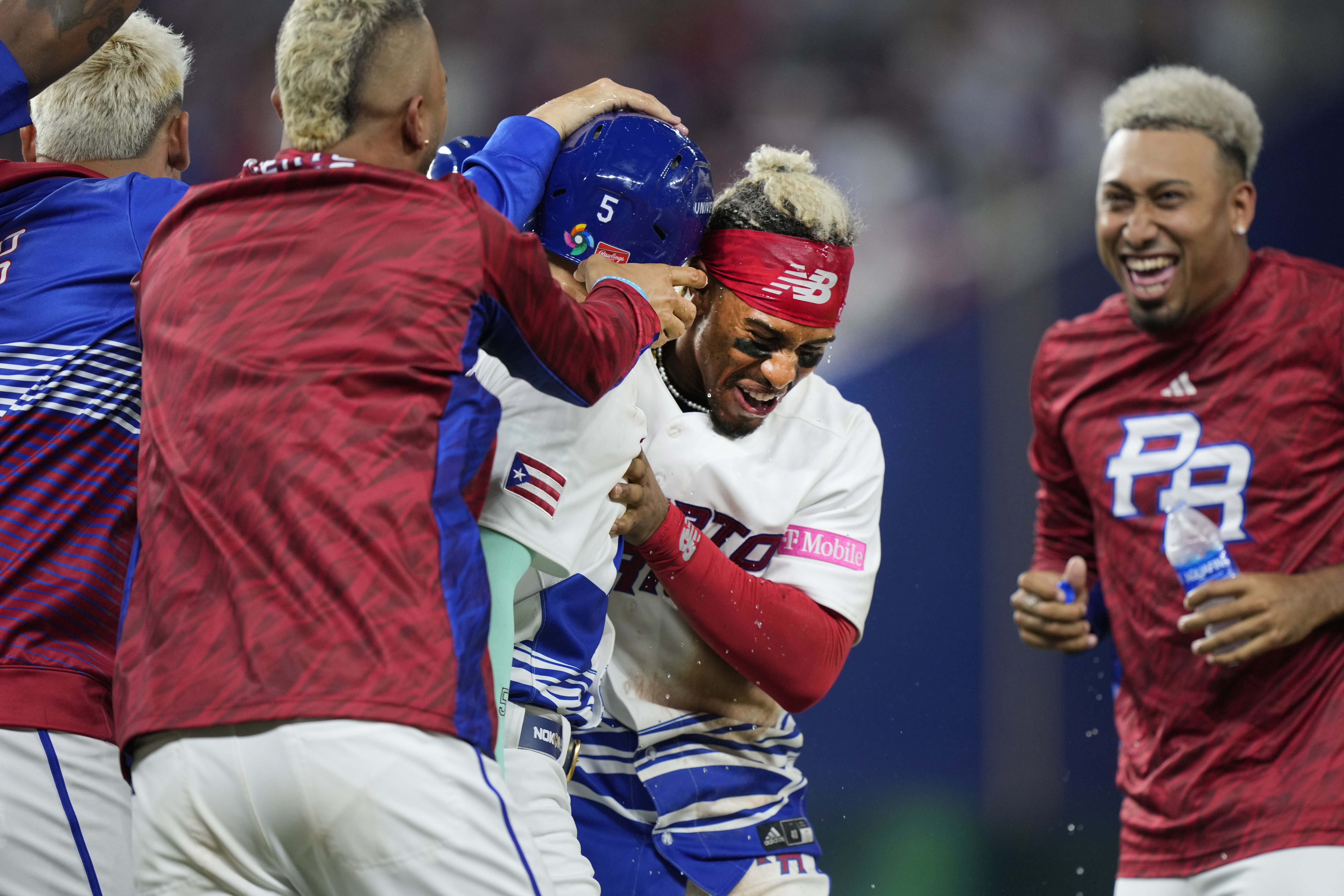 Francisco Lindor and Javier Baez of the Puerto Rico celebrate a
