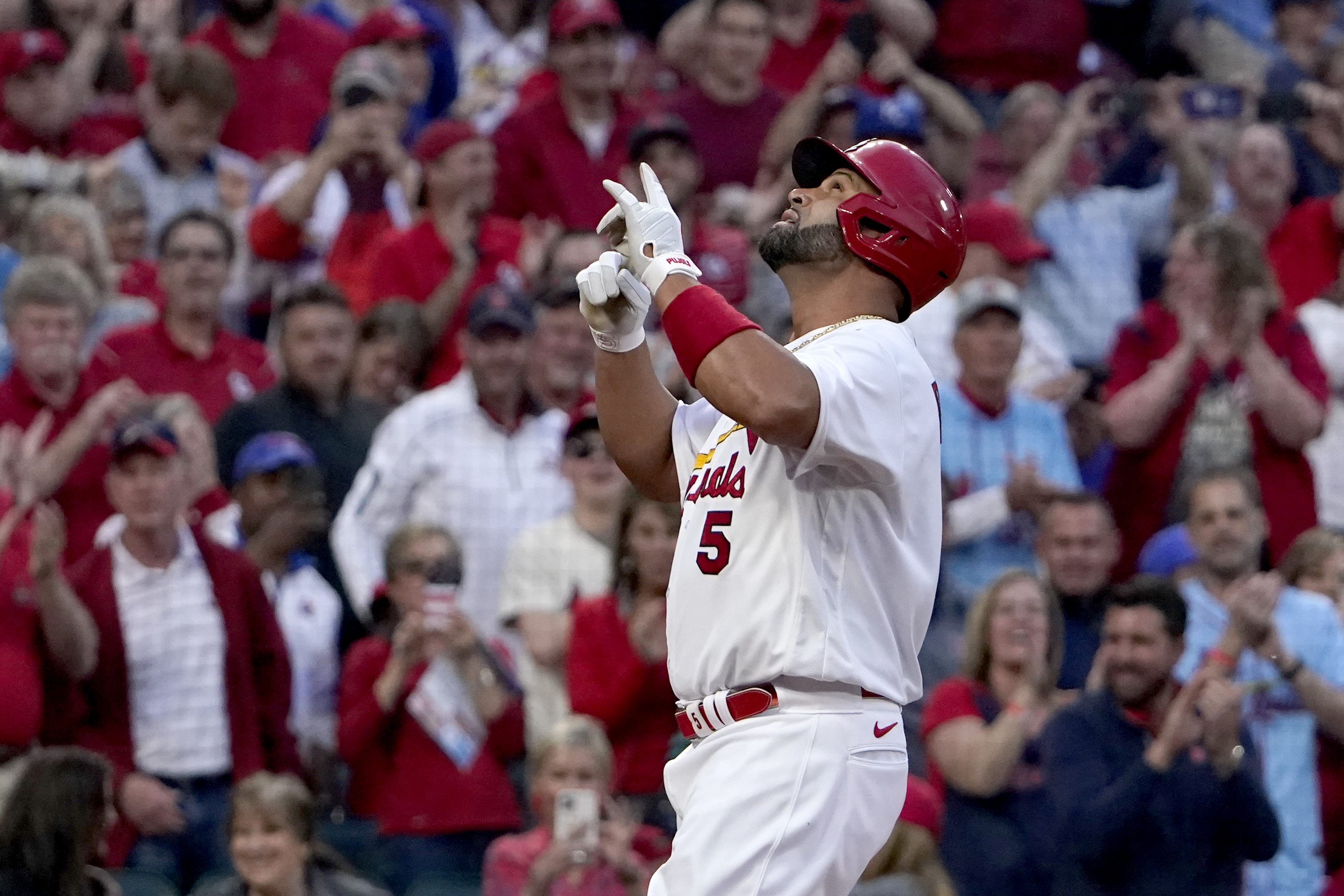 Pujols homers, gets 3 hits to propel Cards past Royals 6-5