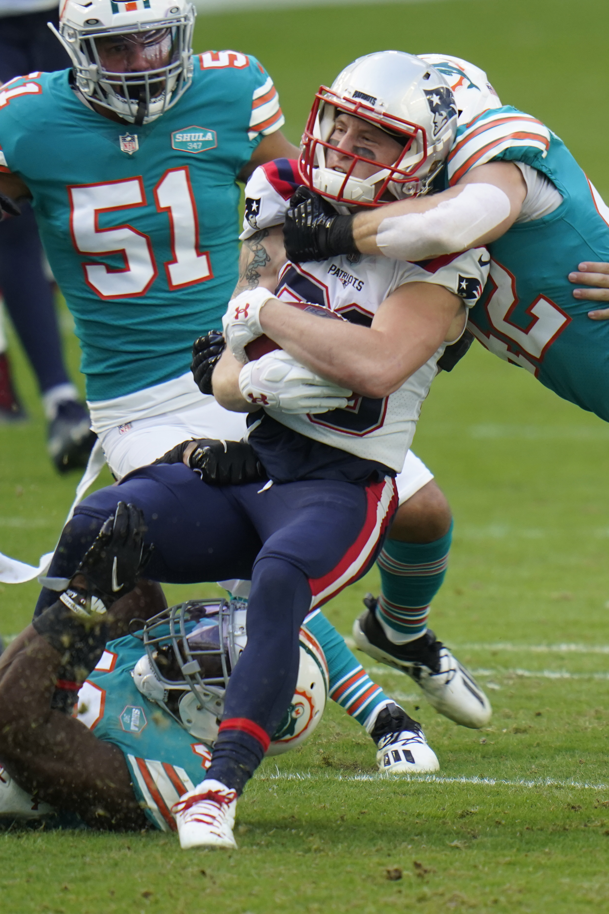 Dolphins eliminate Patriots from playoff race with 22-12 win – The Denver  Post