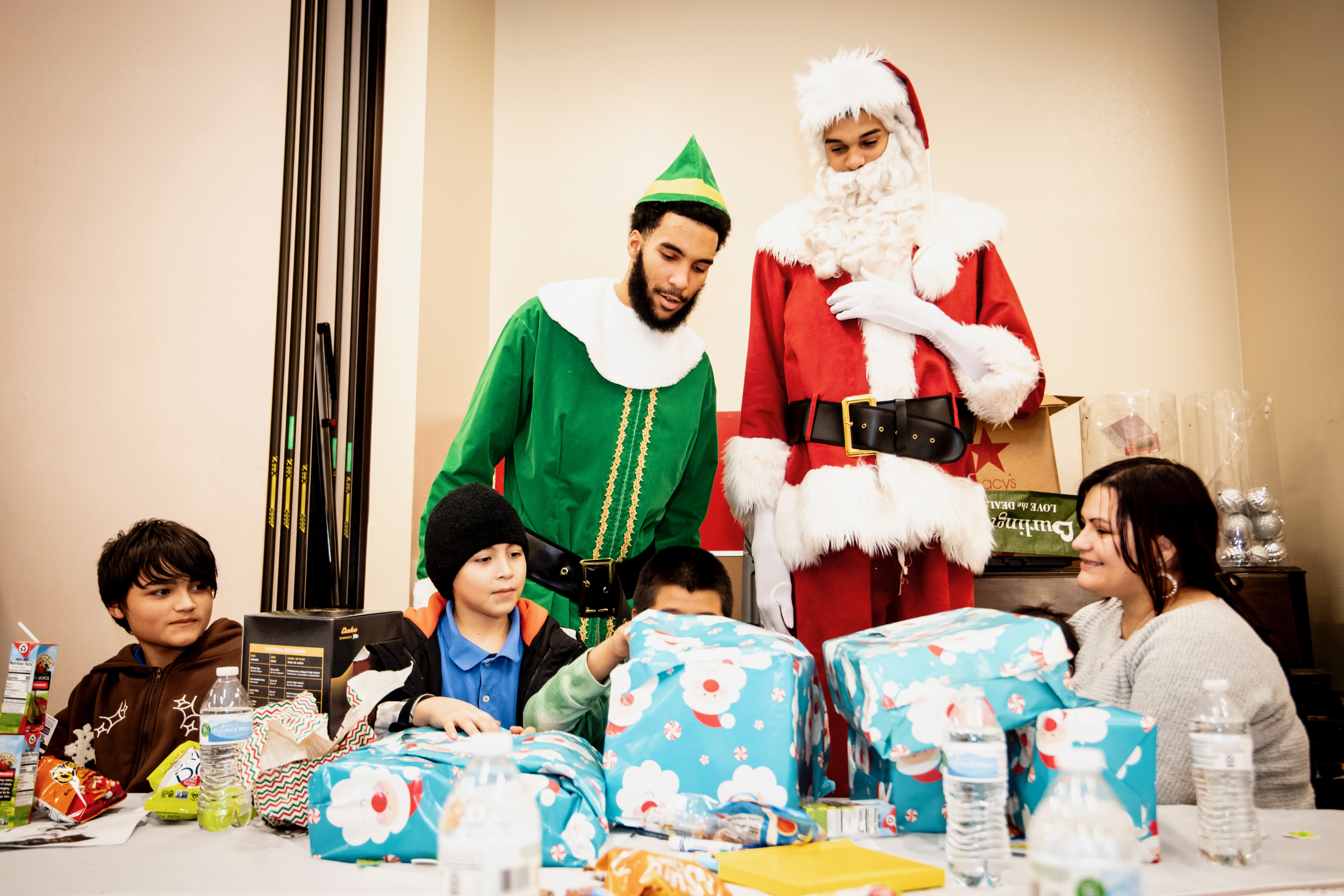 Victor Clause and Elf Julian dash through San Antonio to deliver