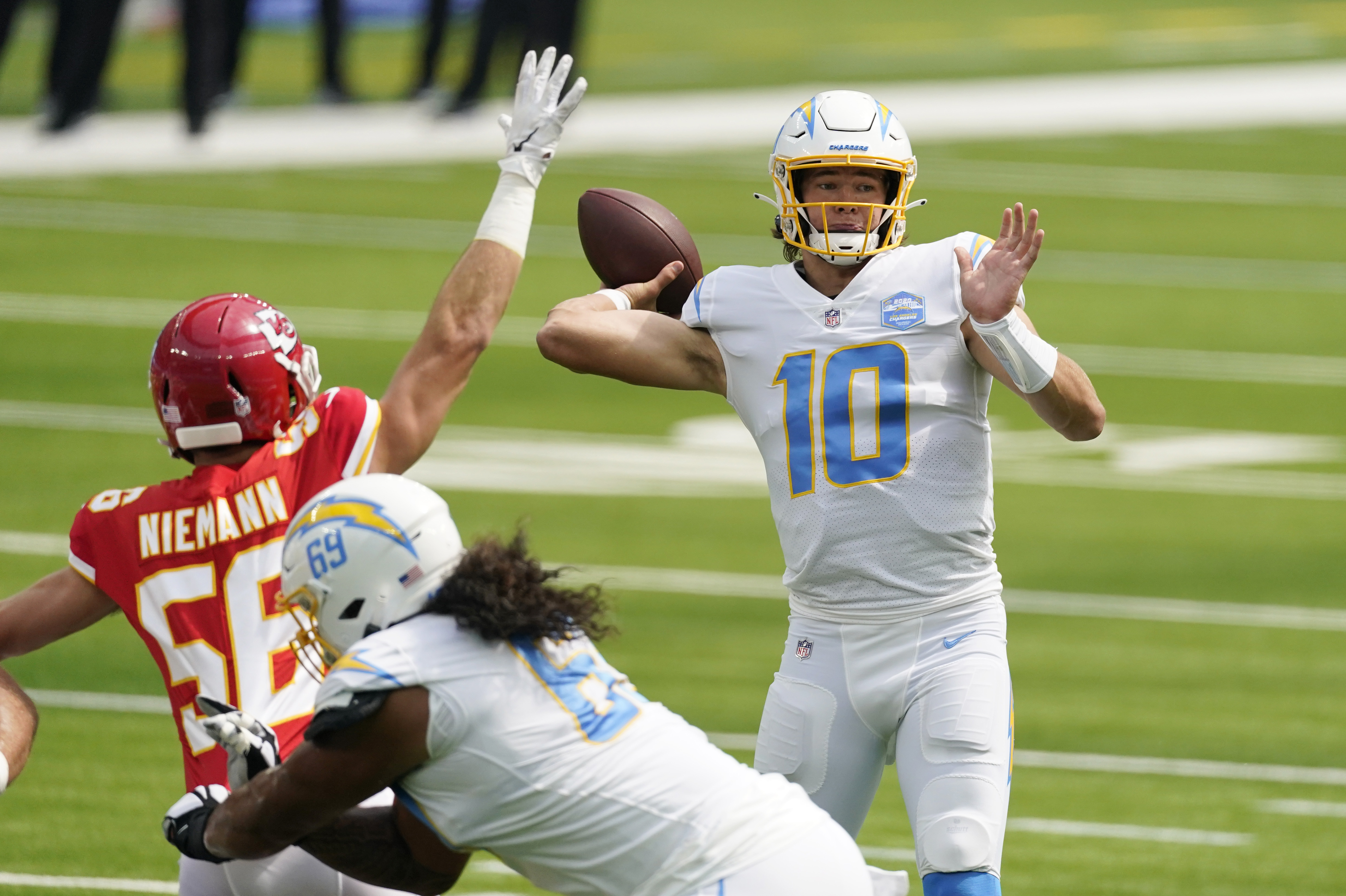 Butker good from 58 in OT, Chiefs survive Herbert's LA debut