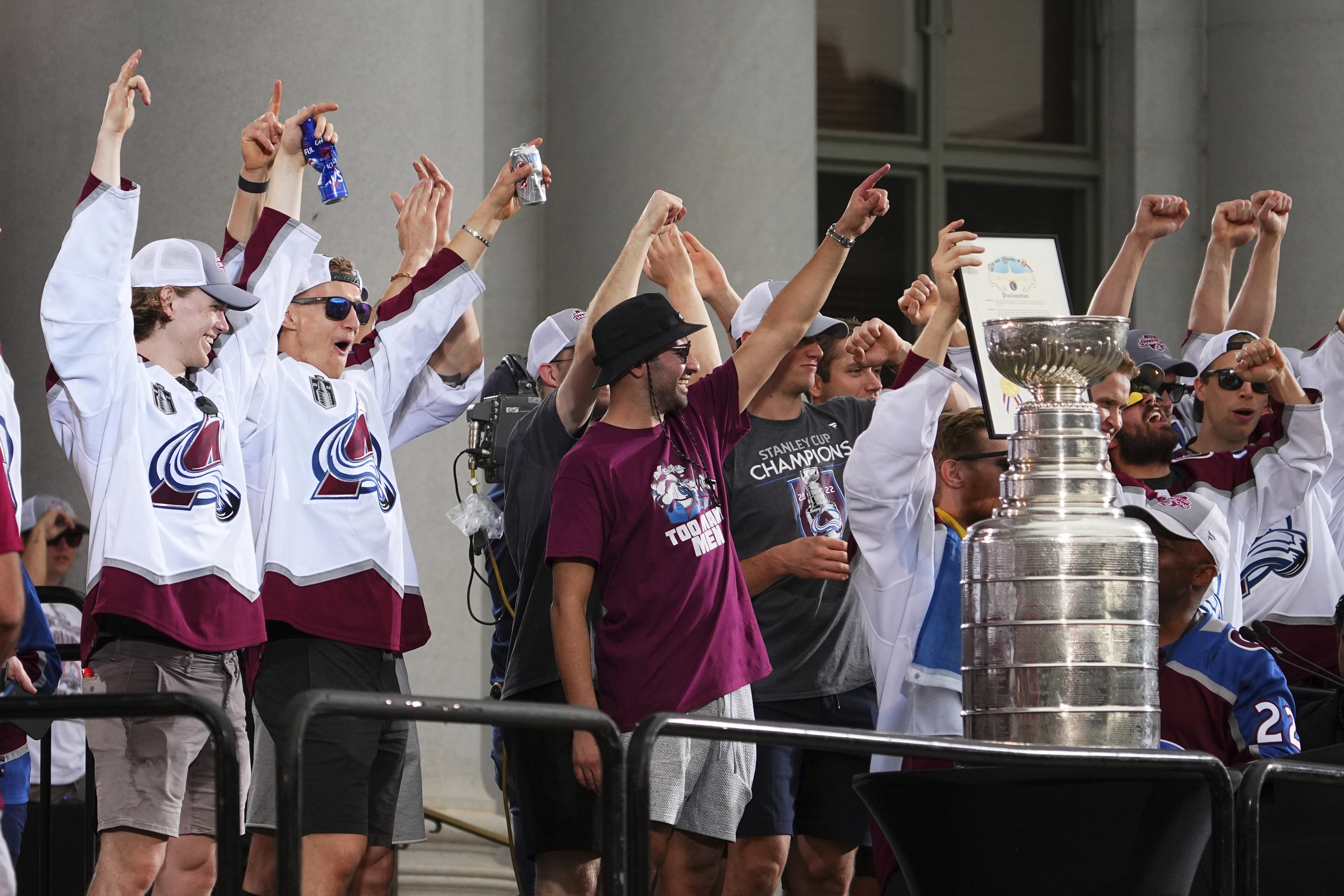After parade, work begins for Avs in bid to repeat as champs