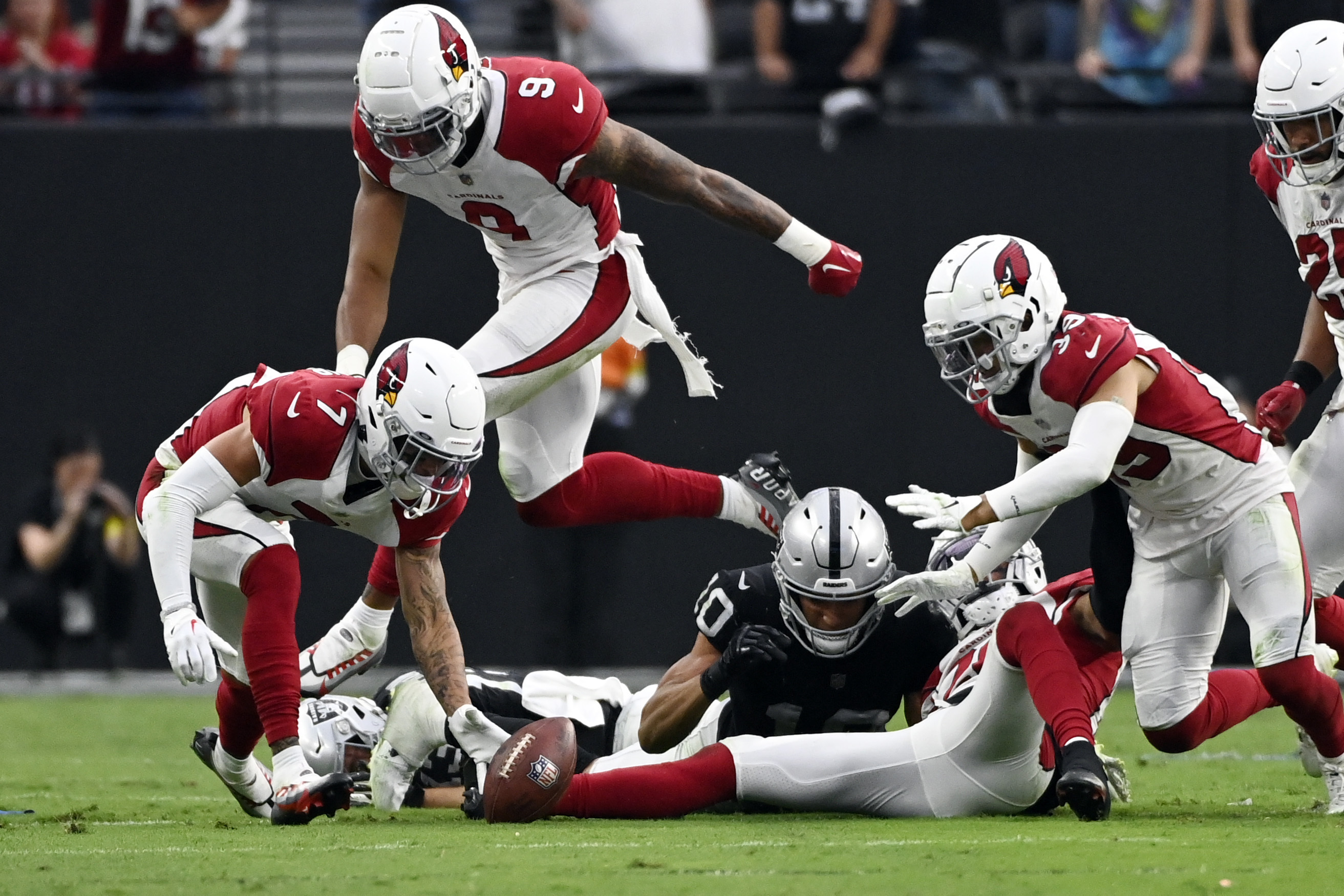 Watch: Raiders defeated by Cardinals after game-losing fumble in OT