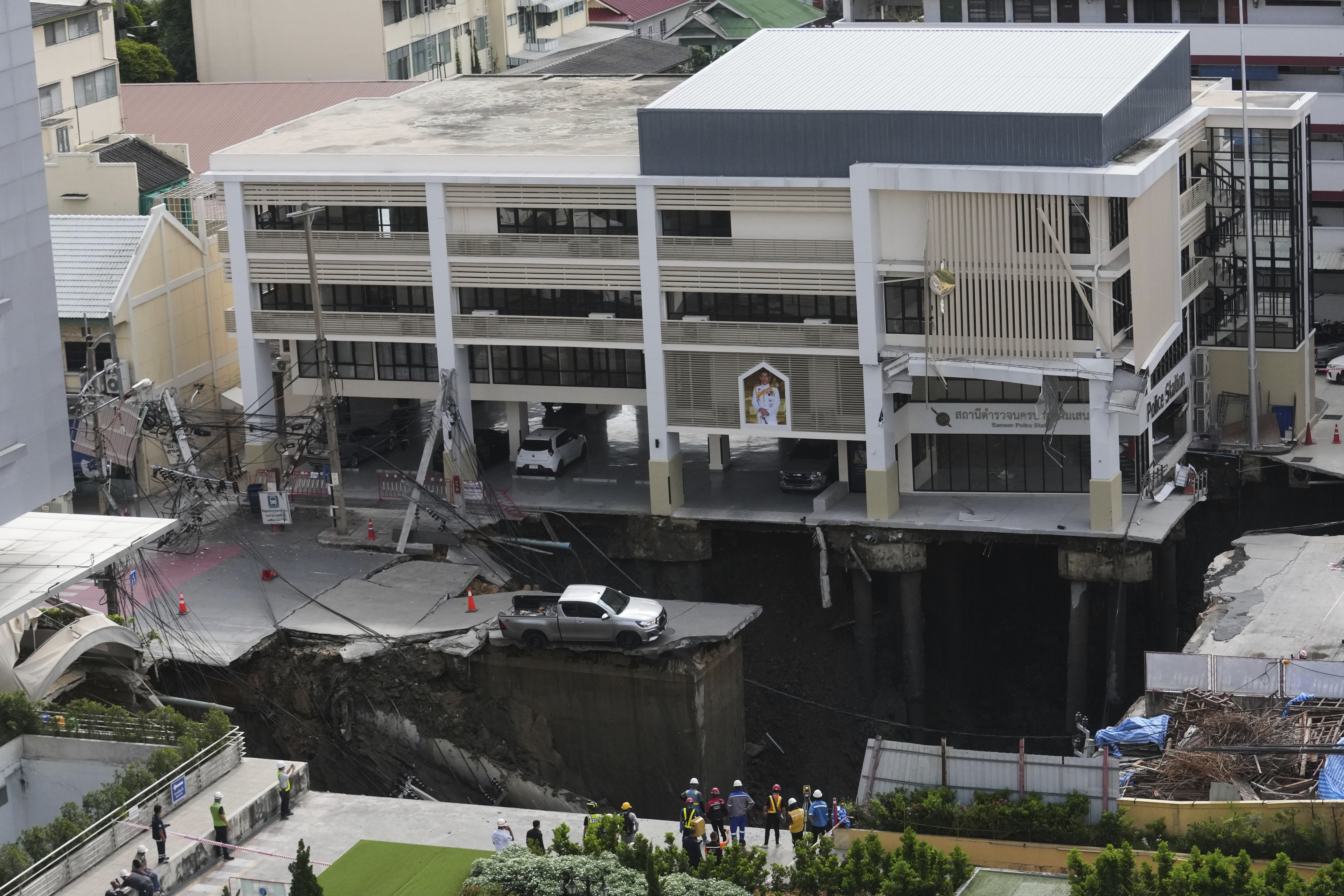 A Bangkok road collapse creates a sinkhole disrupting traffic and