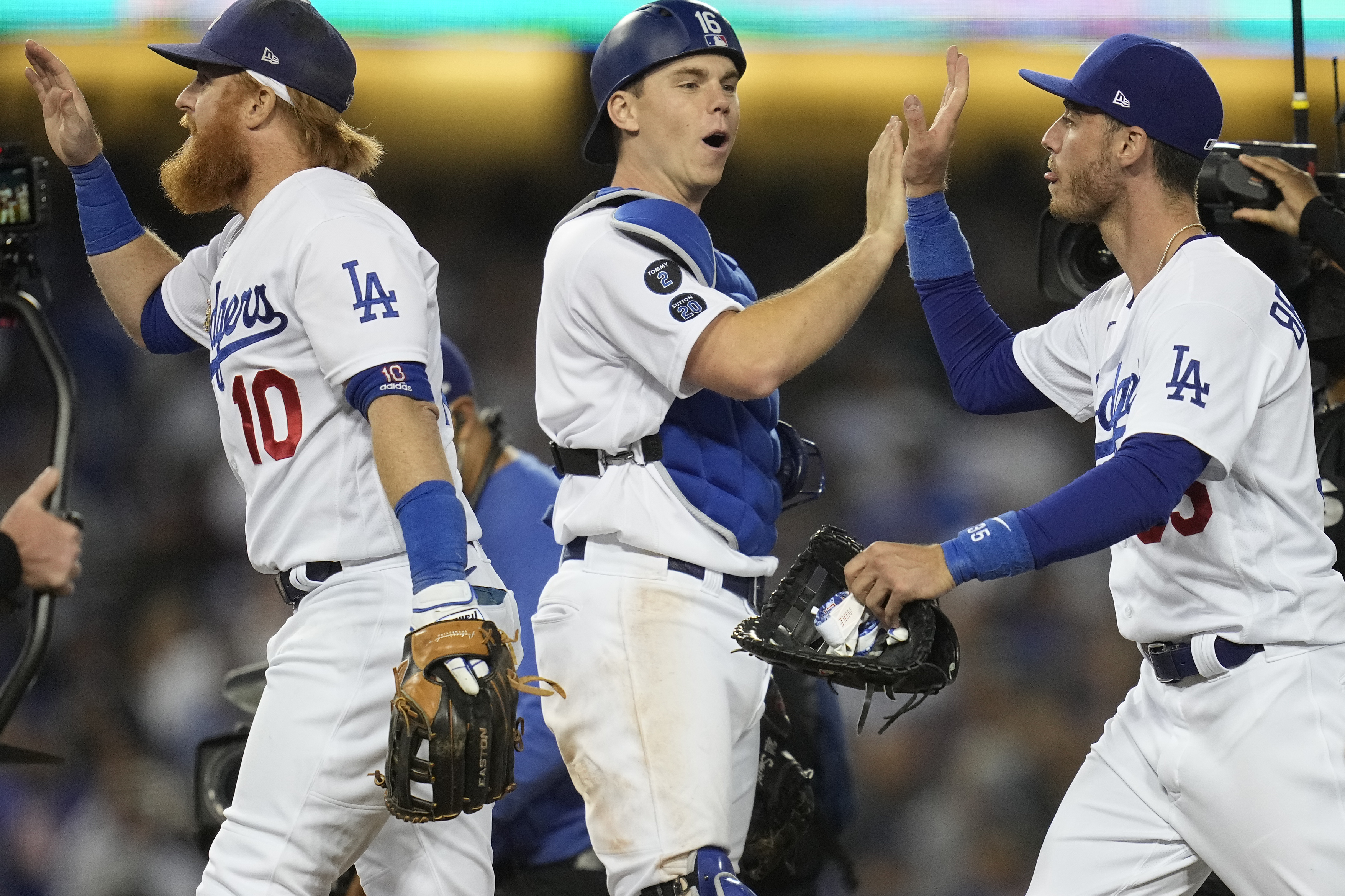 A patch for announcer Vin Scully is shown on the jersey of Los Angeles  Dodgers' Gavin Lux before a baseball game between the San Francisco Giants  and the Dodgers in San Francisco