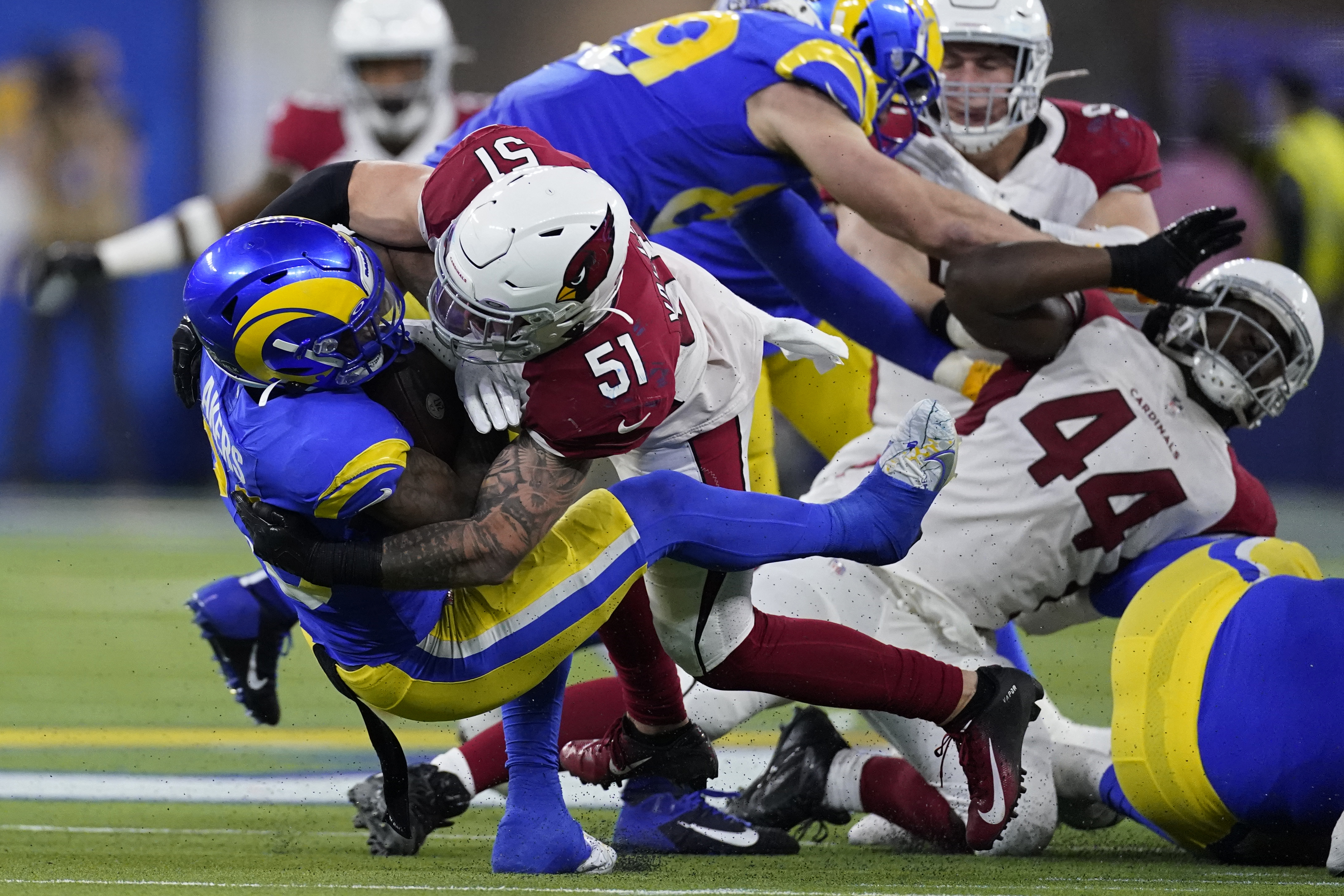 Matthew Stafford propels Rams past Cardinals 34-11 in playoff rout