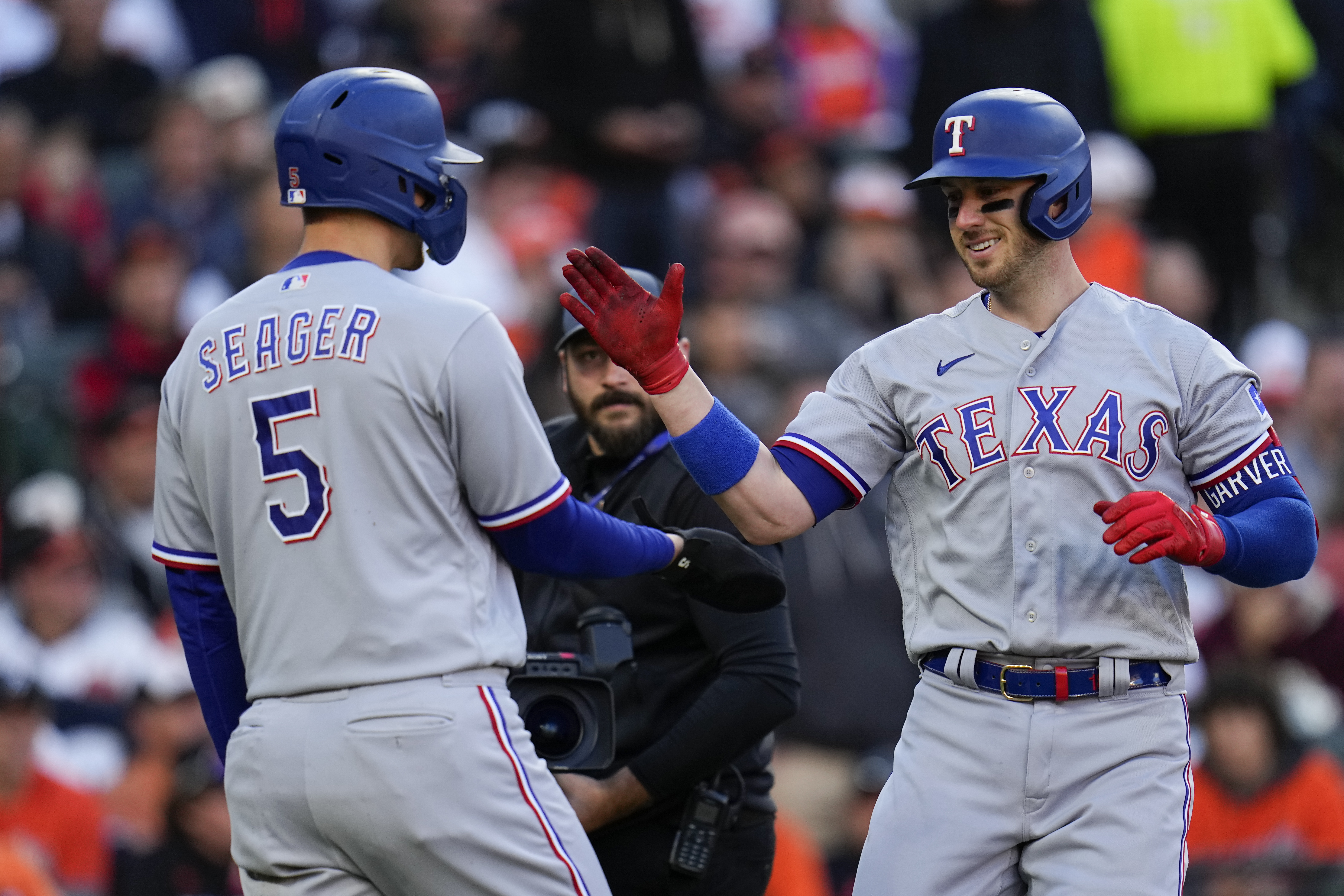 Mitch Garver hits grand slam as Rangers beat Orioles 11-8 in Game