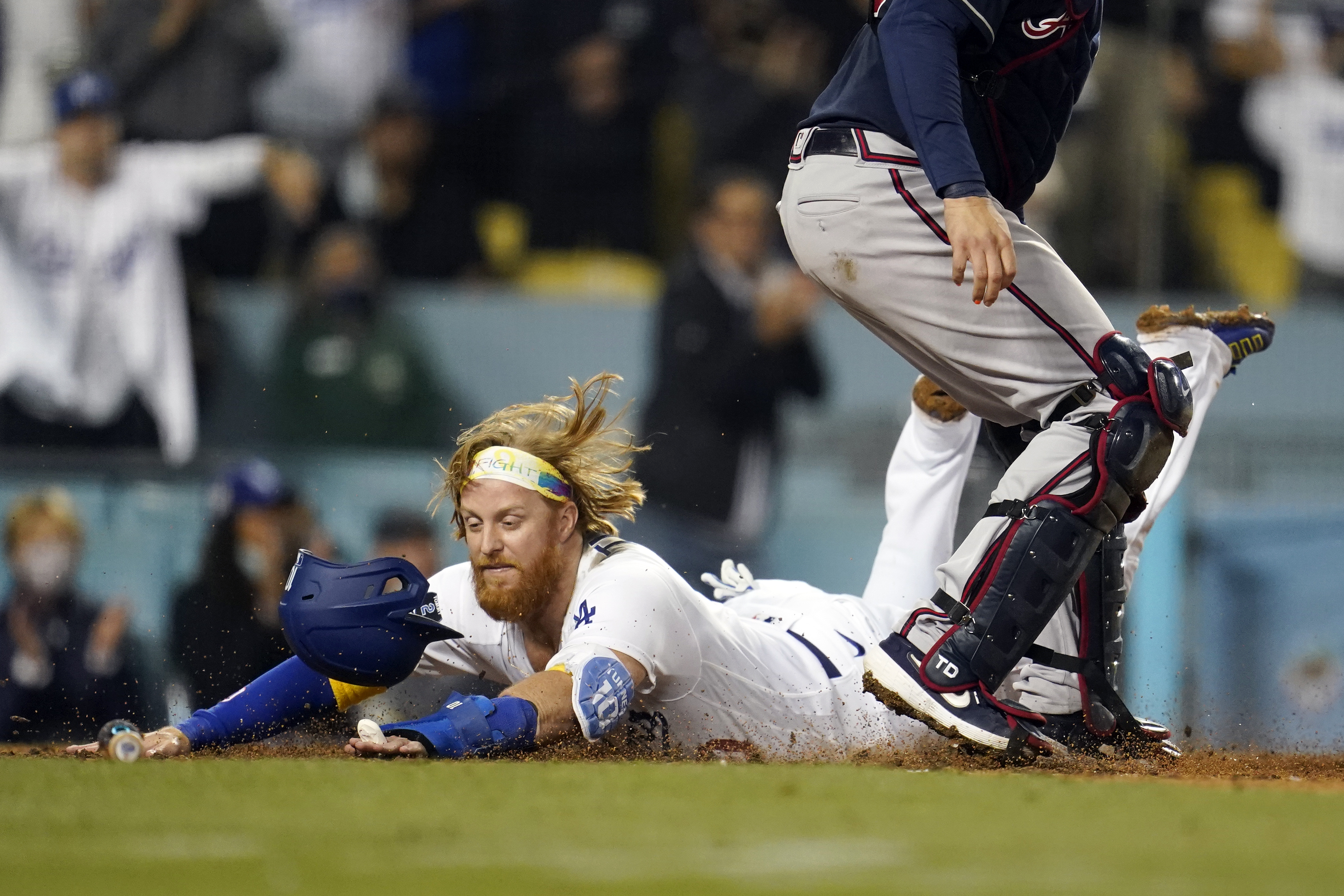 Dodgers infielder Max Muncy and his wife Kellie, left, with their