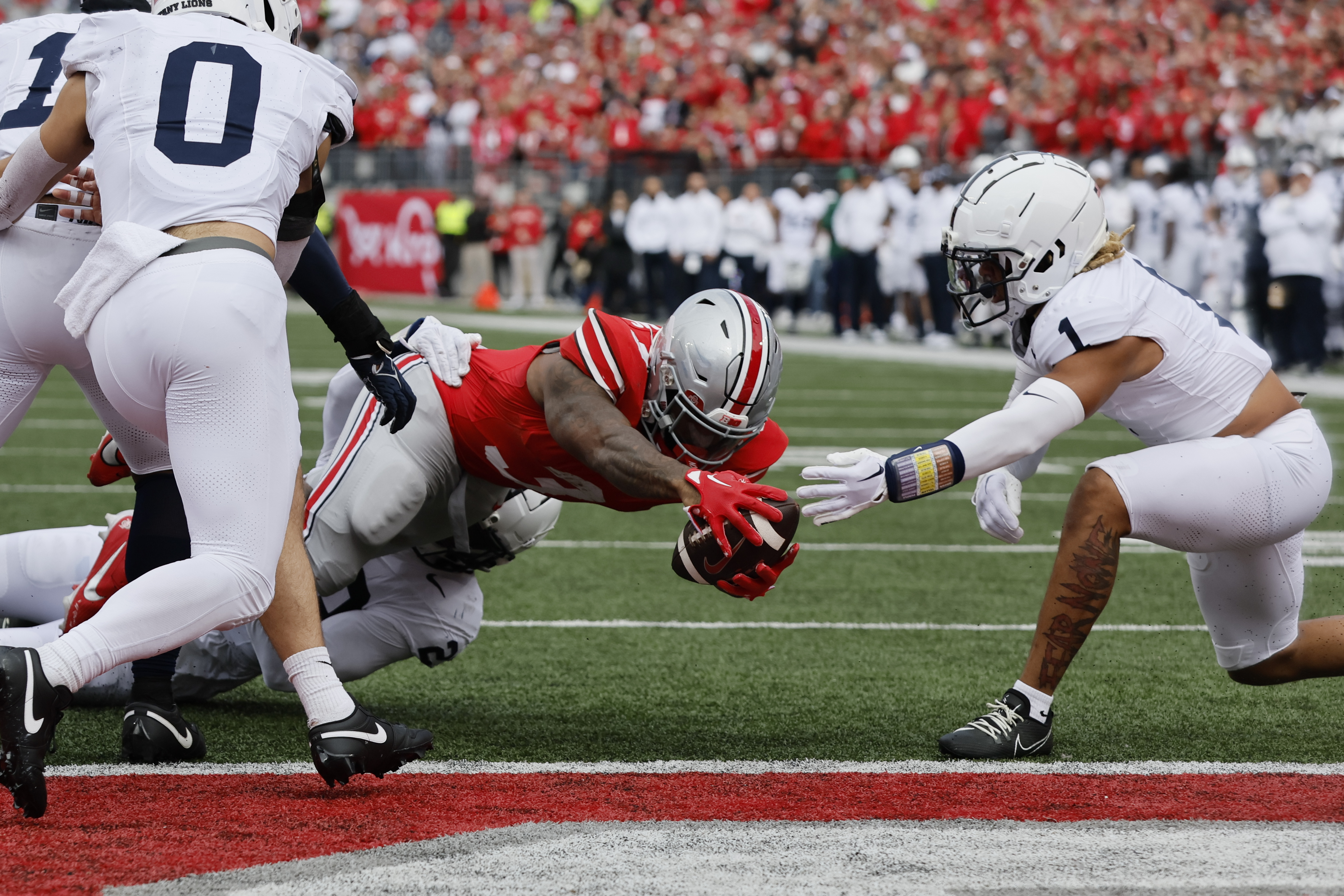 Harrison Jr. the difference as No. 3 Ohio State beats No. 7 Penn State  20-12 in a defensive struggle