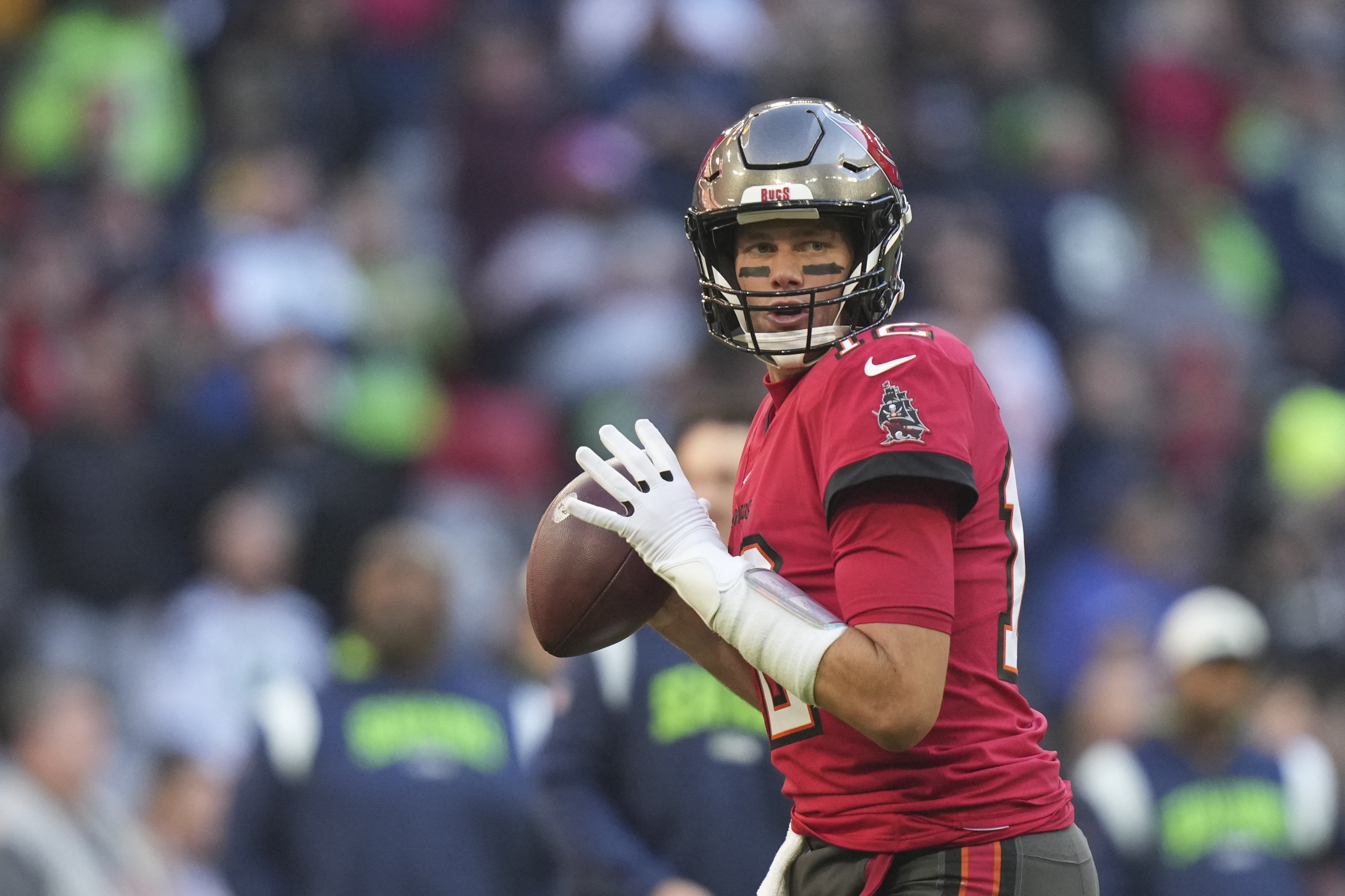 Denver Broncos quarterback Russell Wilson walks off the field during the  second half of an NFL football game against the Tennessee Titians Sunday,  Nov. 13, 2022, in Nashville, Tenn. (AP Photo/Mark Zaleski