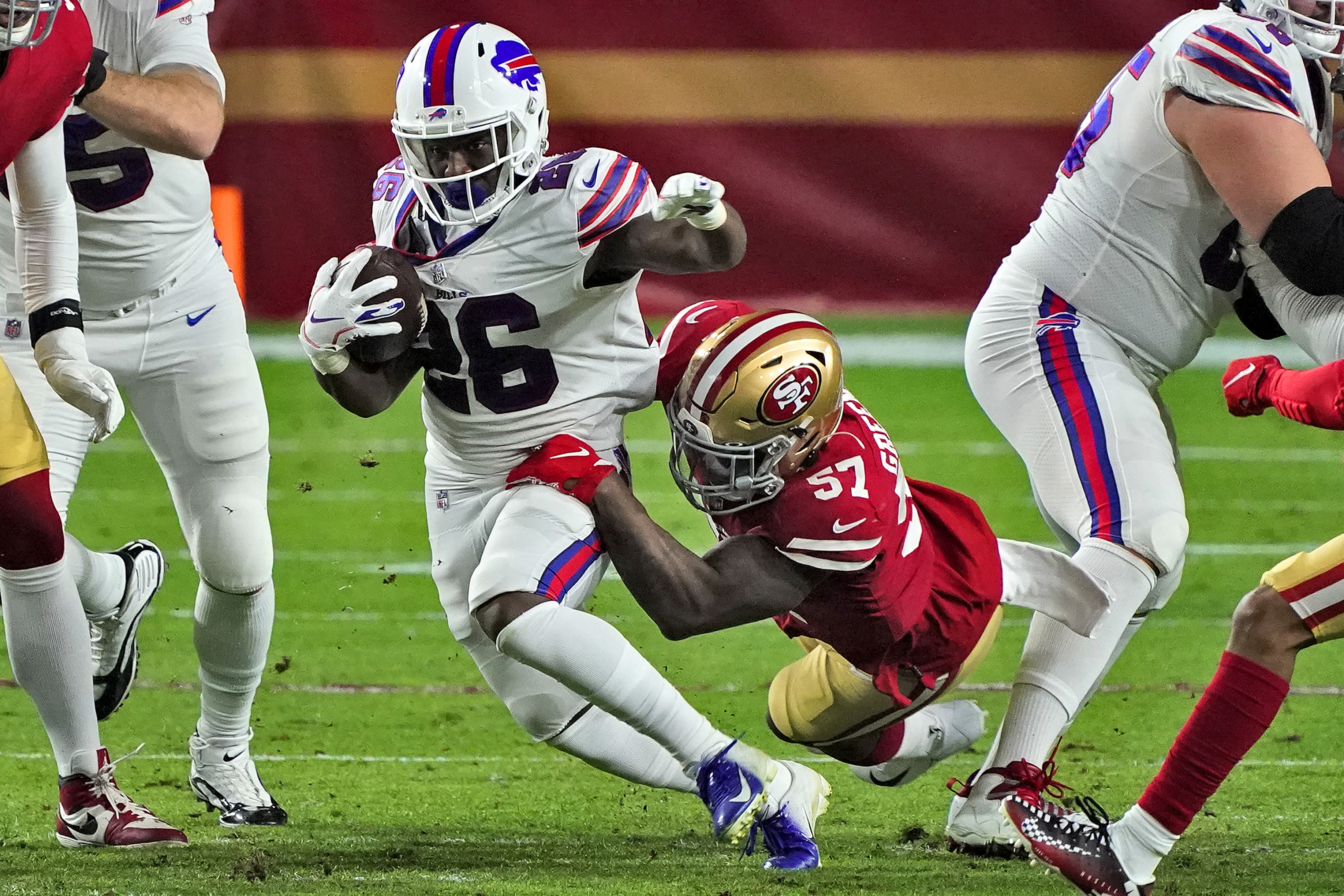 San Francisco 49ers linebacker Dre Greenlaw (57) stands in the