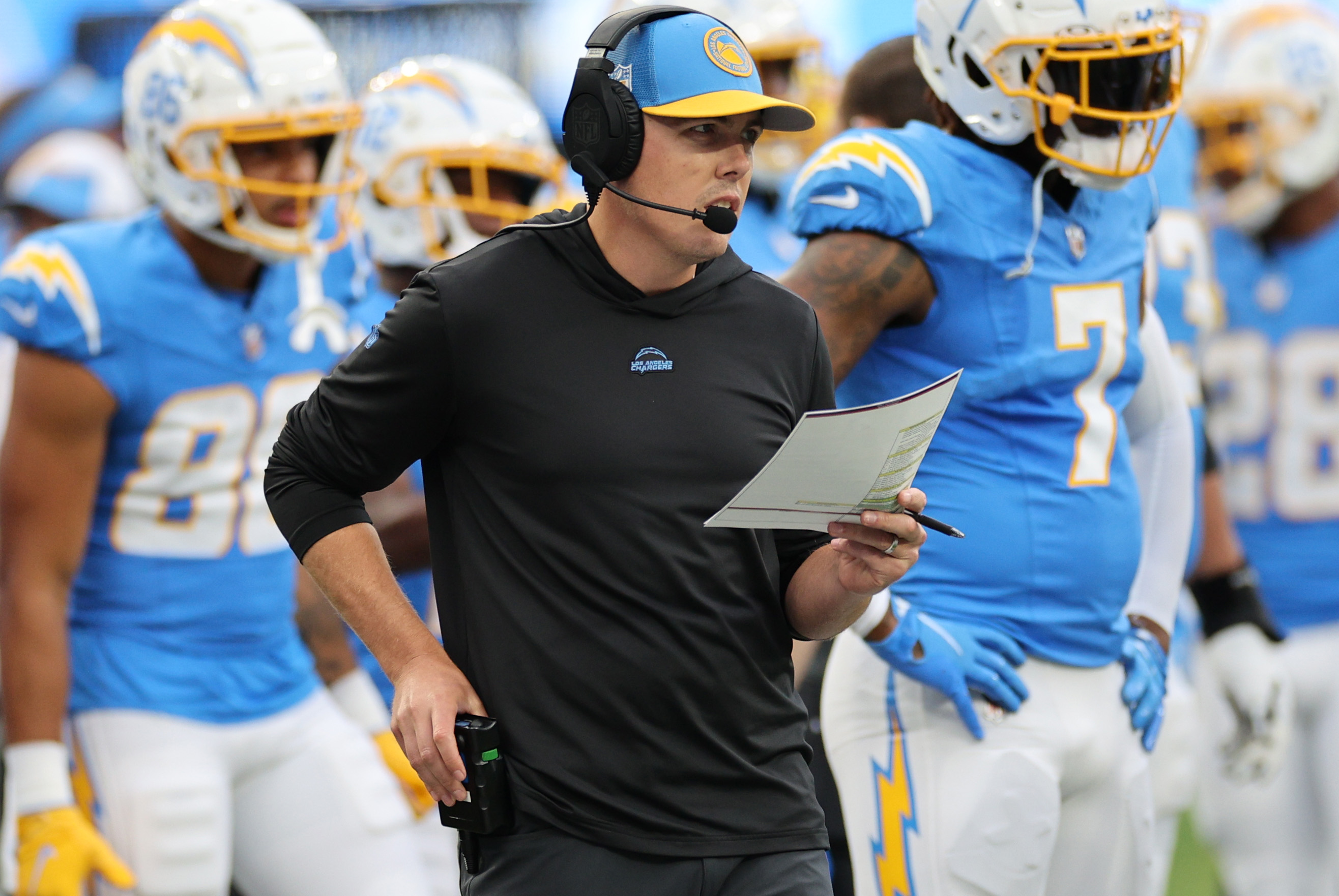 Chargers offensive coordinator Kellen Moore tries to tone down