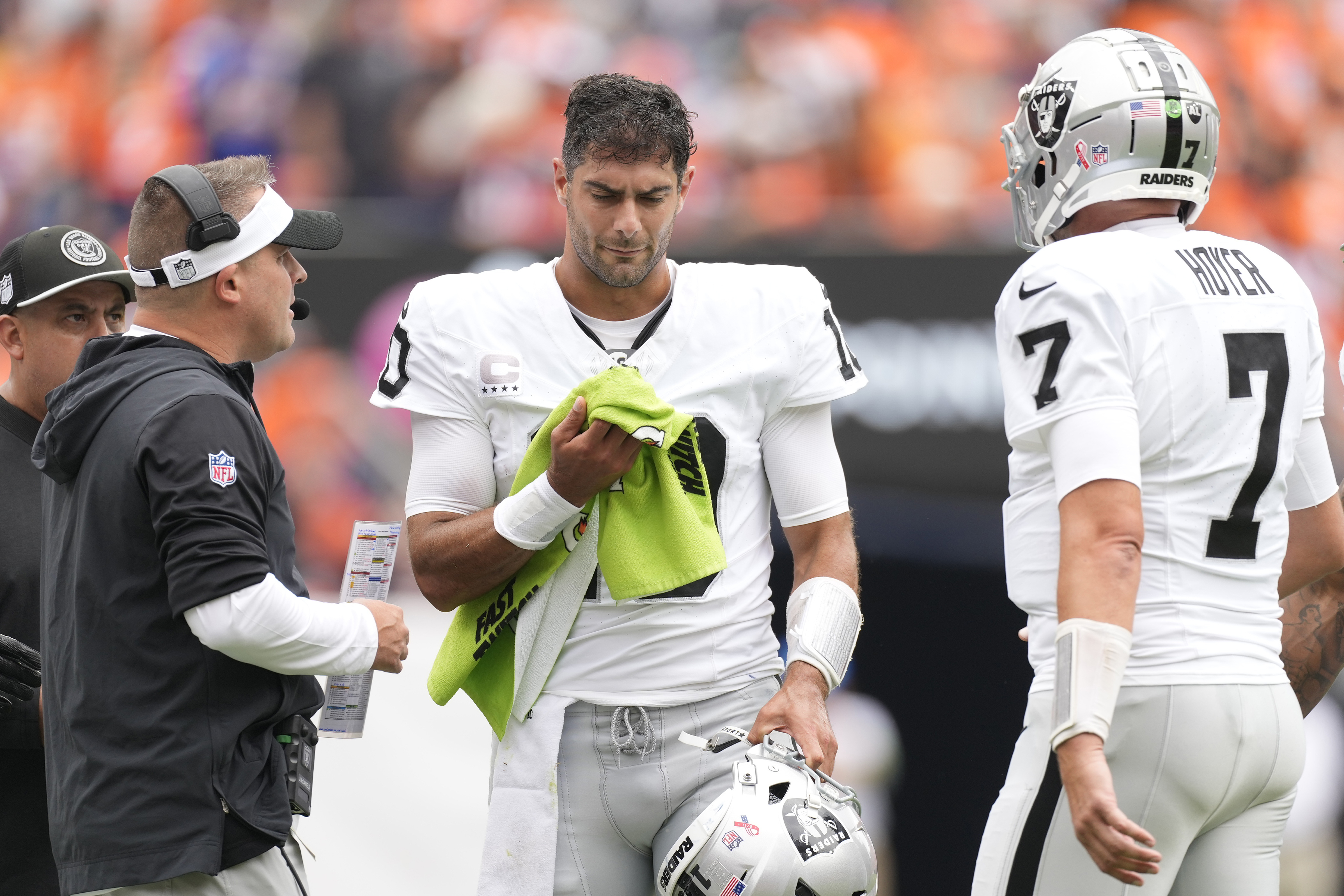 Las Vegas Raiders quarterback Jimmy Garoppolo, center, is sacked by  Pittsburgh Steelers linebacker T.J. Watt, right, as defensive end DeMarvin  Leal runs in during an NFL football game Sunday, Sept. 24, 2023