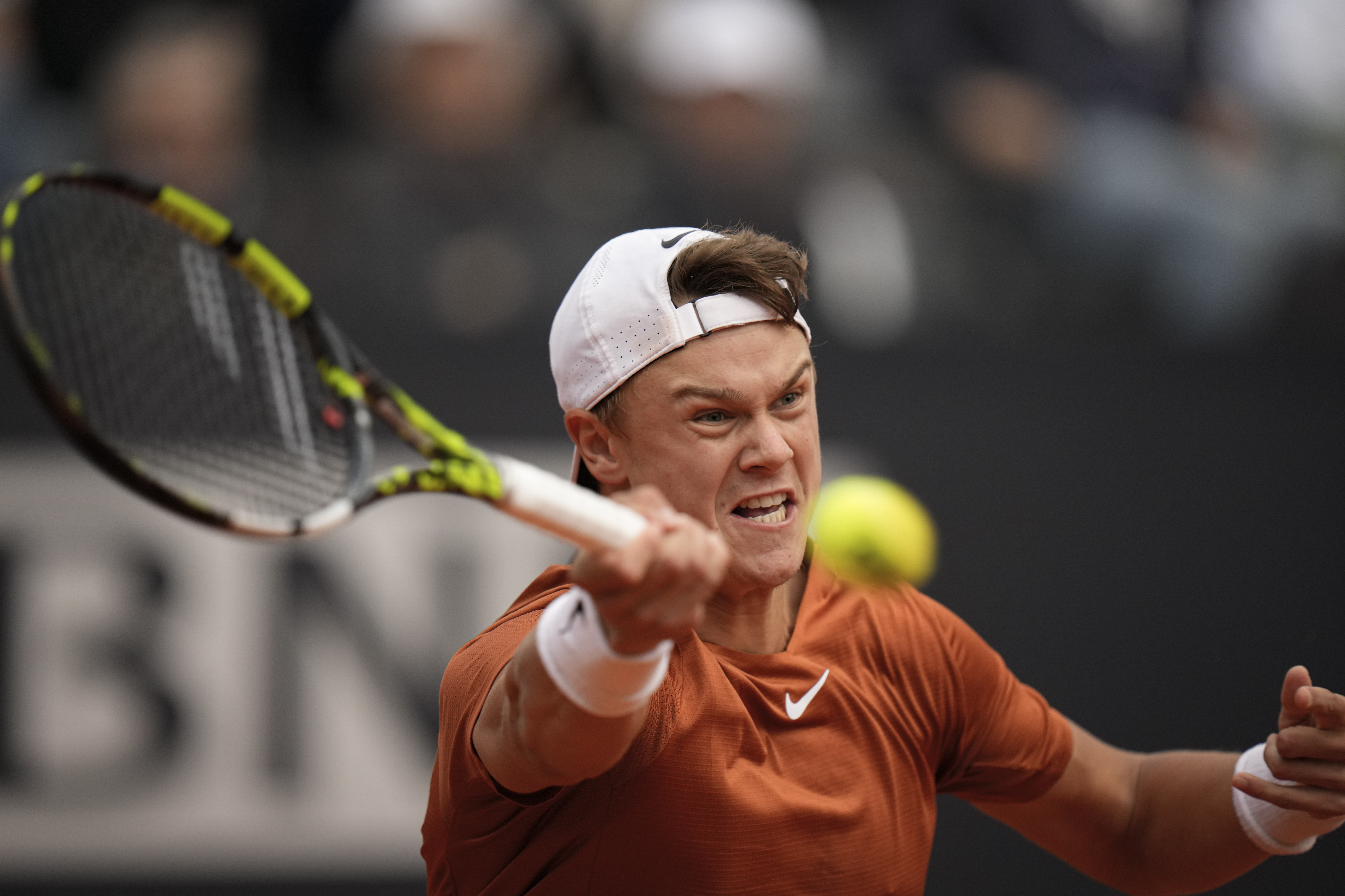 Medvedev makes his mark on clay by beating Rune for Italian Open title