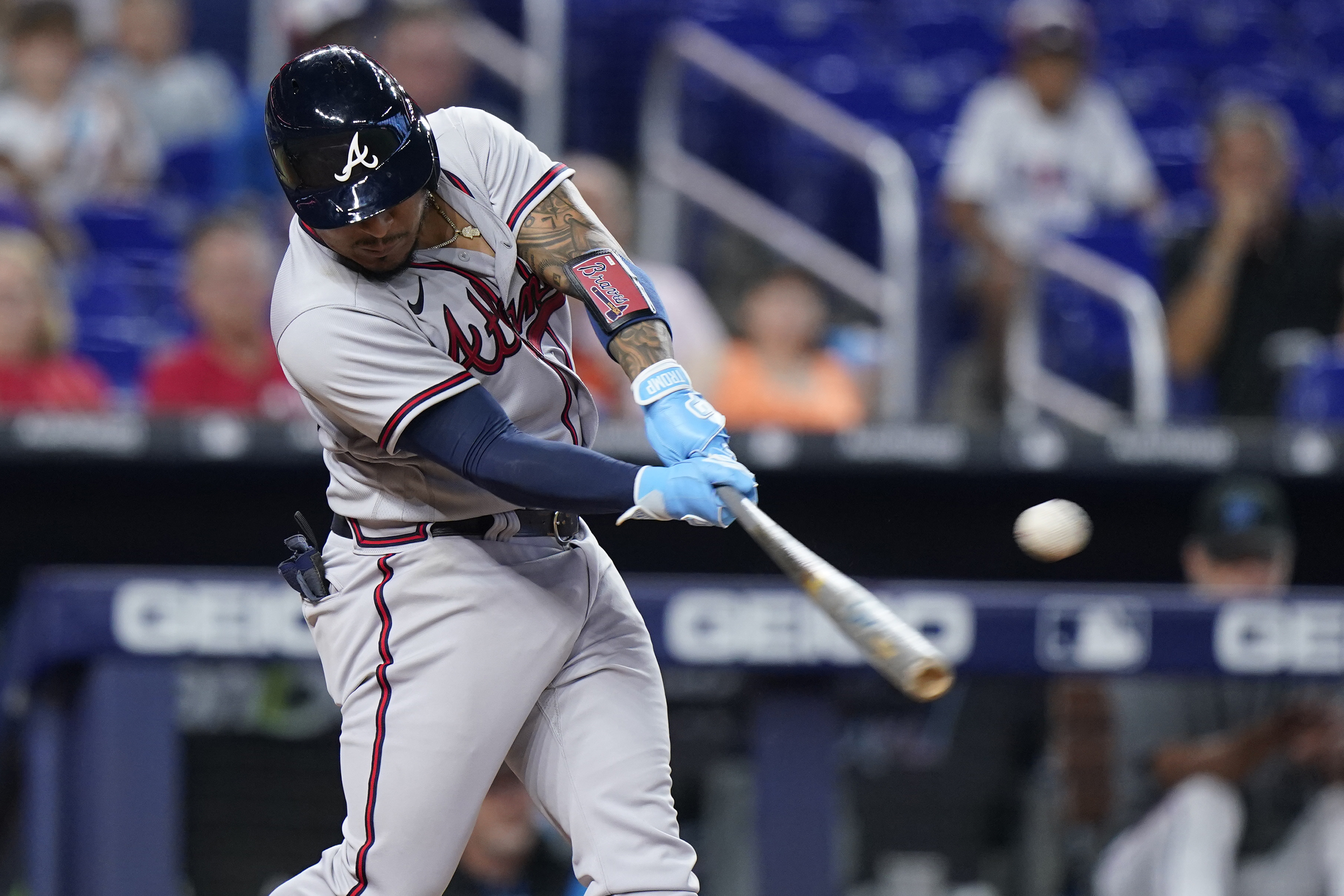 Miami Marlins' Peyton Burdick (6) celebrates his home run with