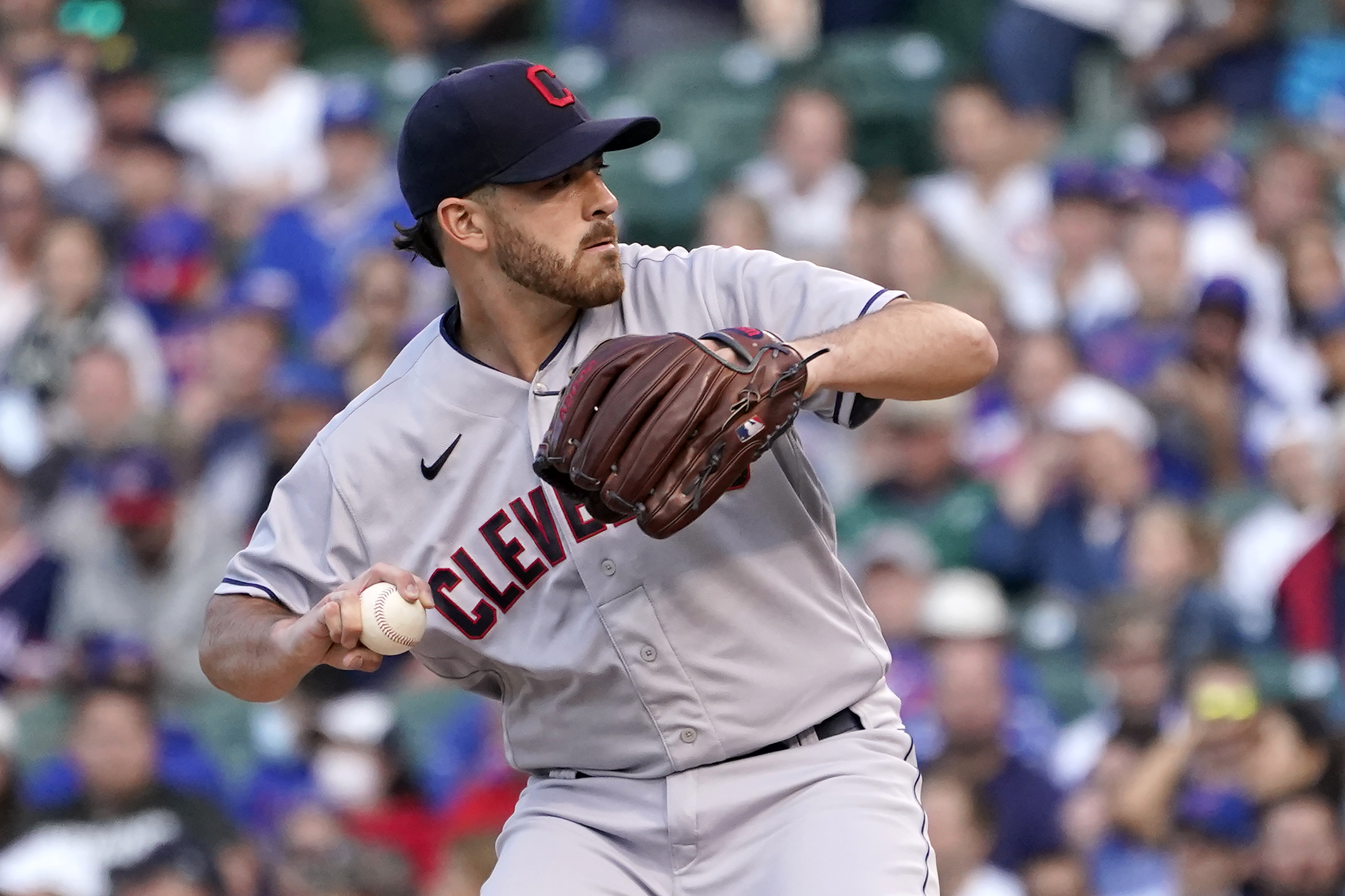 Indians SP Zach Plesac fractures thumb while taking shirt off