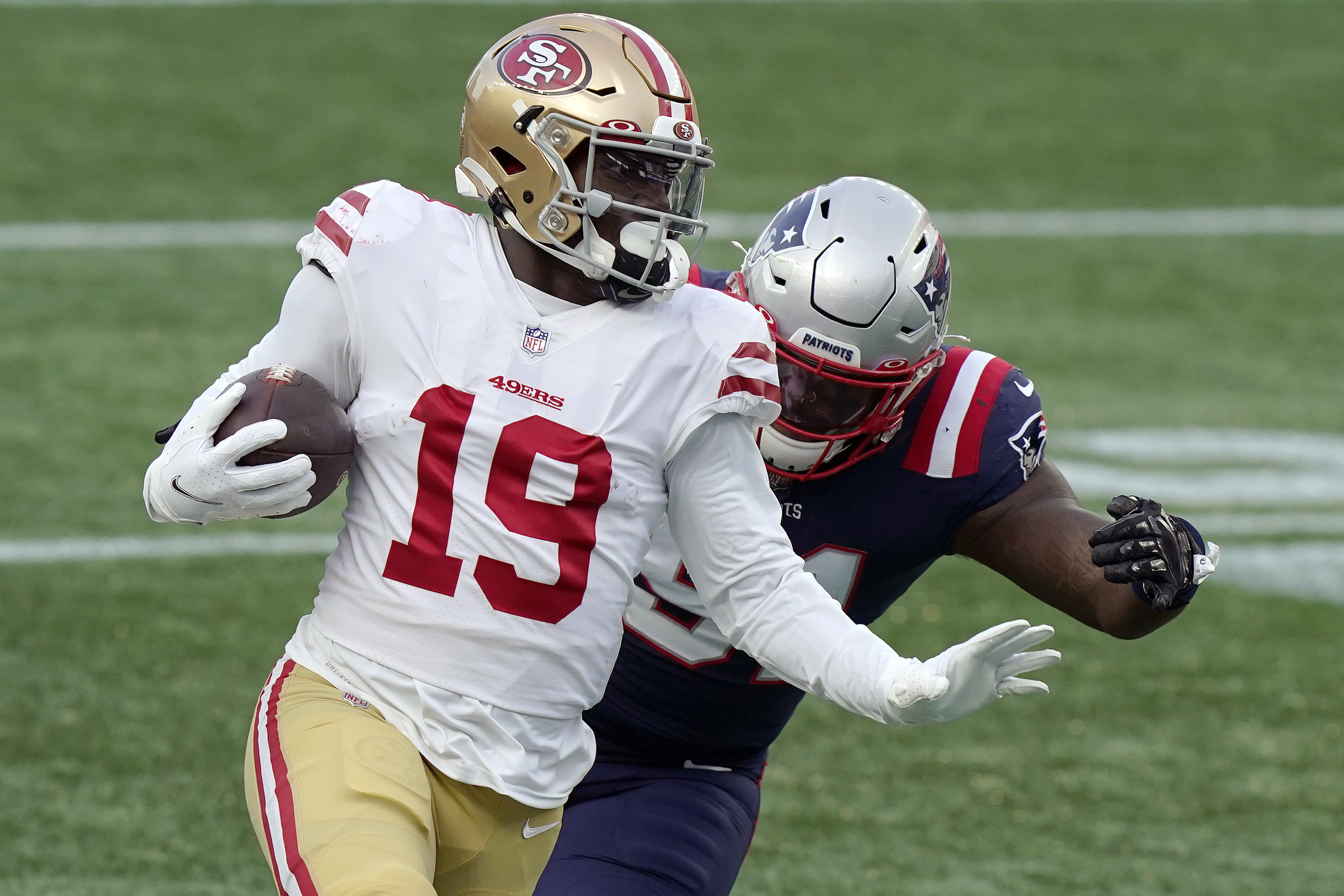 Wilson has 3 TDs before injury, 49ers crush Patriots 33-6