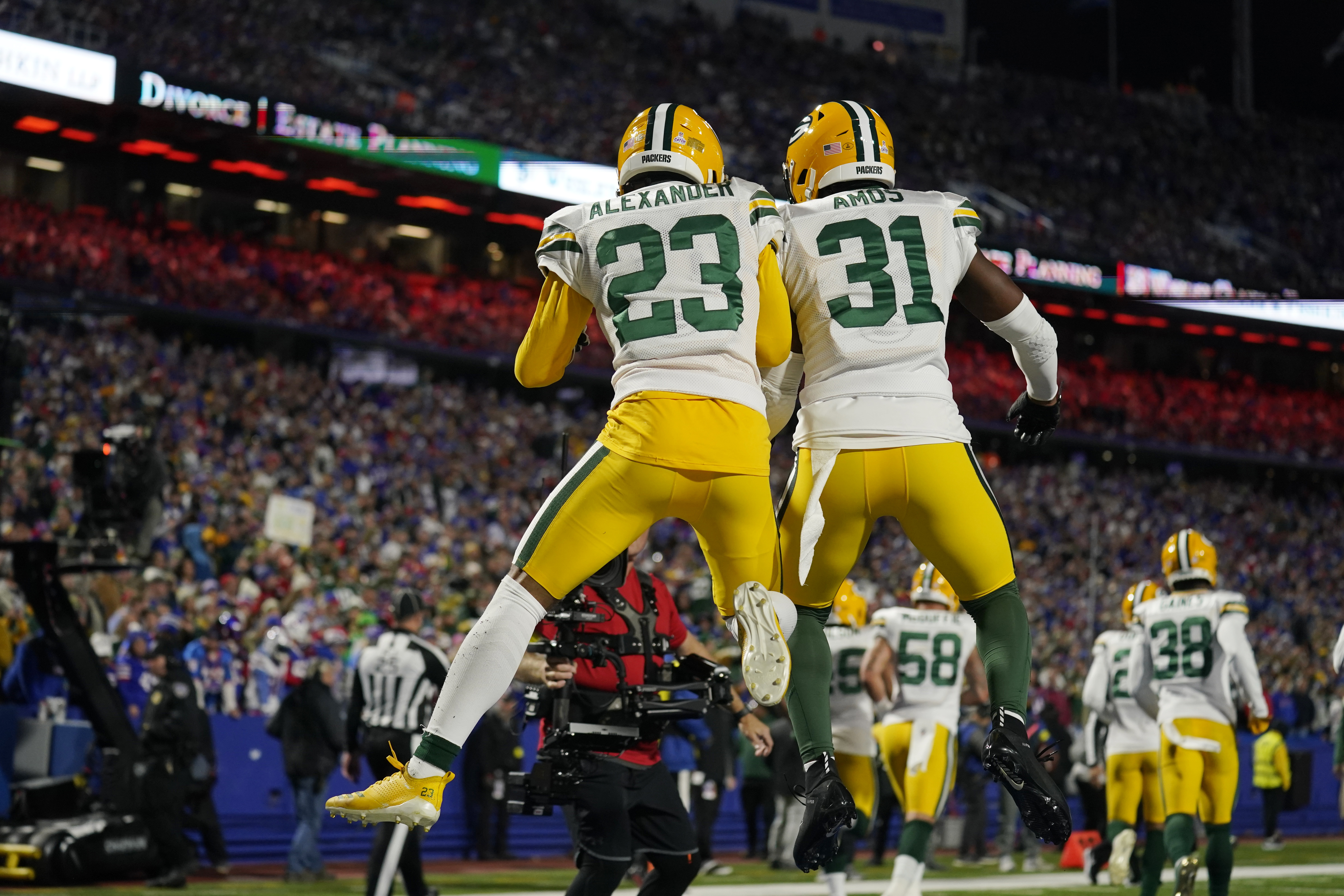 Green Bay Packers cornerback Jaire Alexander (23) walks off the