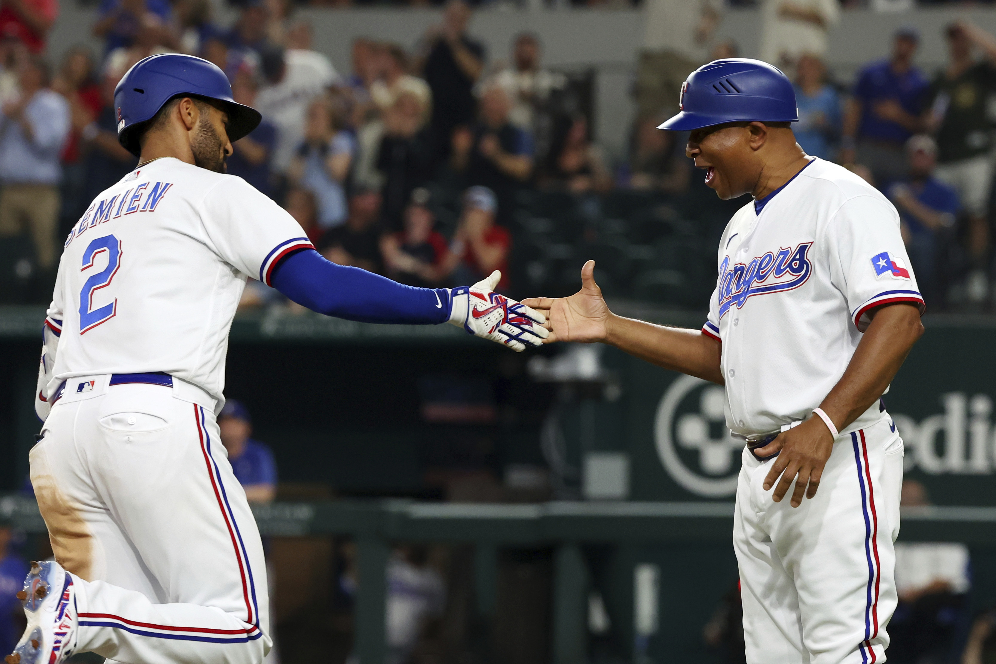 Heaney strikes out 11, Garver and Garcia homer as Rangers beat