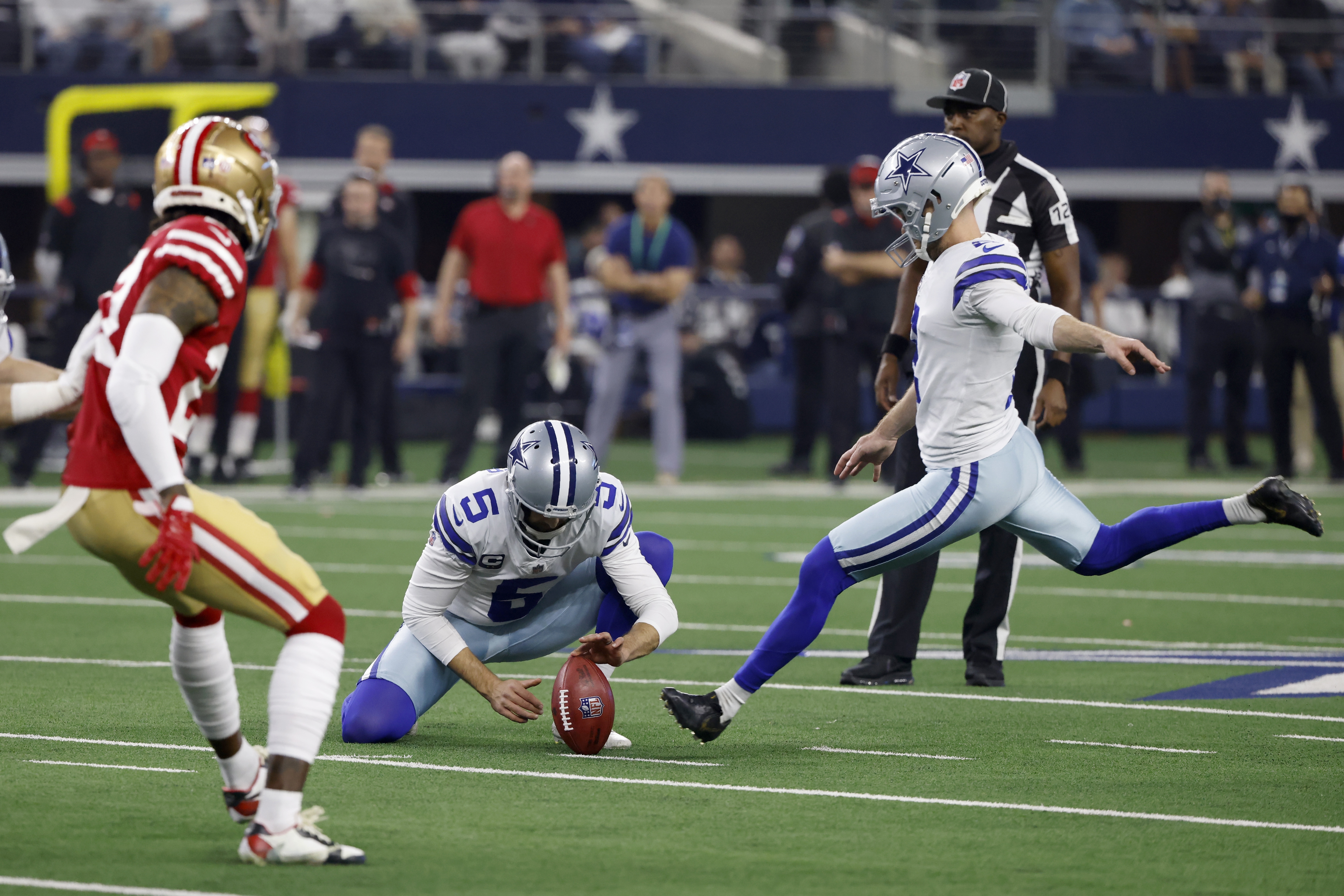 San Francisco 49ers quarterback Jimmy Garoppolo (10) is seen on the  sidelines during a wild card NFL football game against the Dallas Cowboys,  Sunday, Jan. 16, 2022, in Arlington, Texas. San Francisco