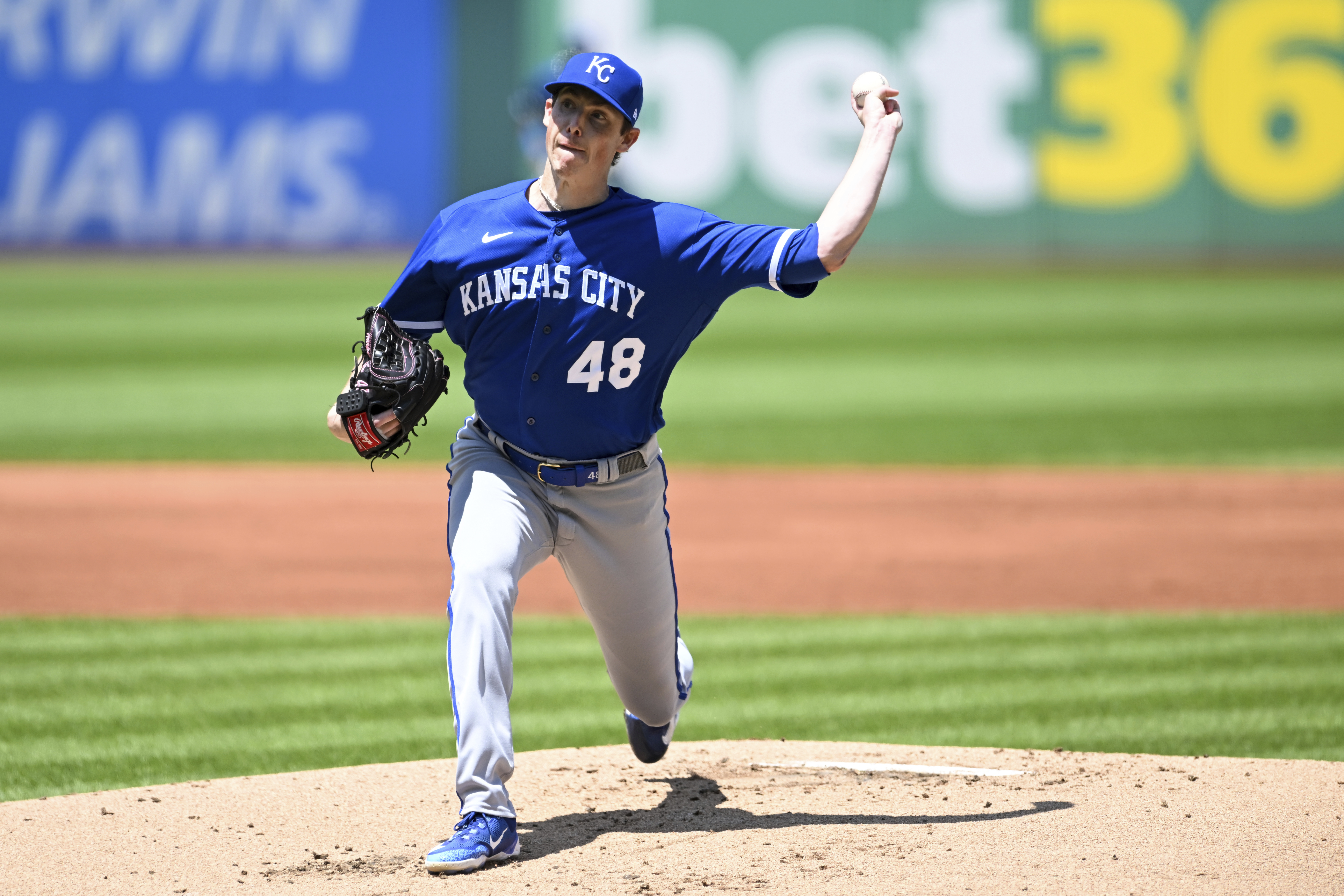 Photo: Royals Kyle Isbel Dives Toward Home Plate on Opening Day