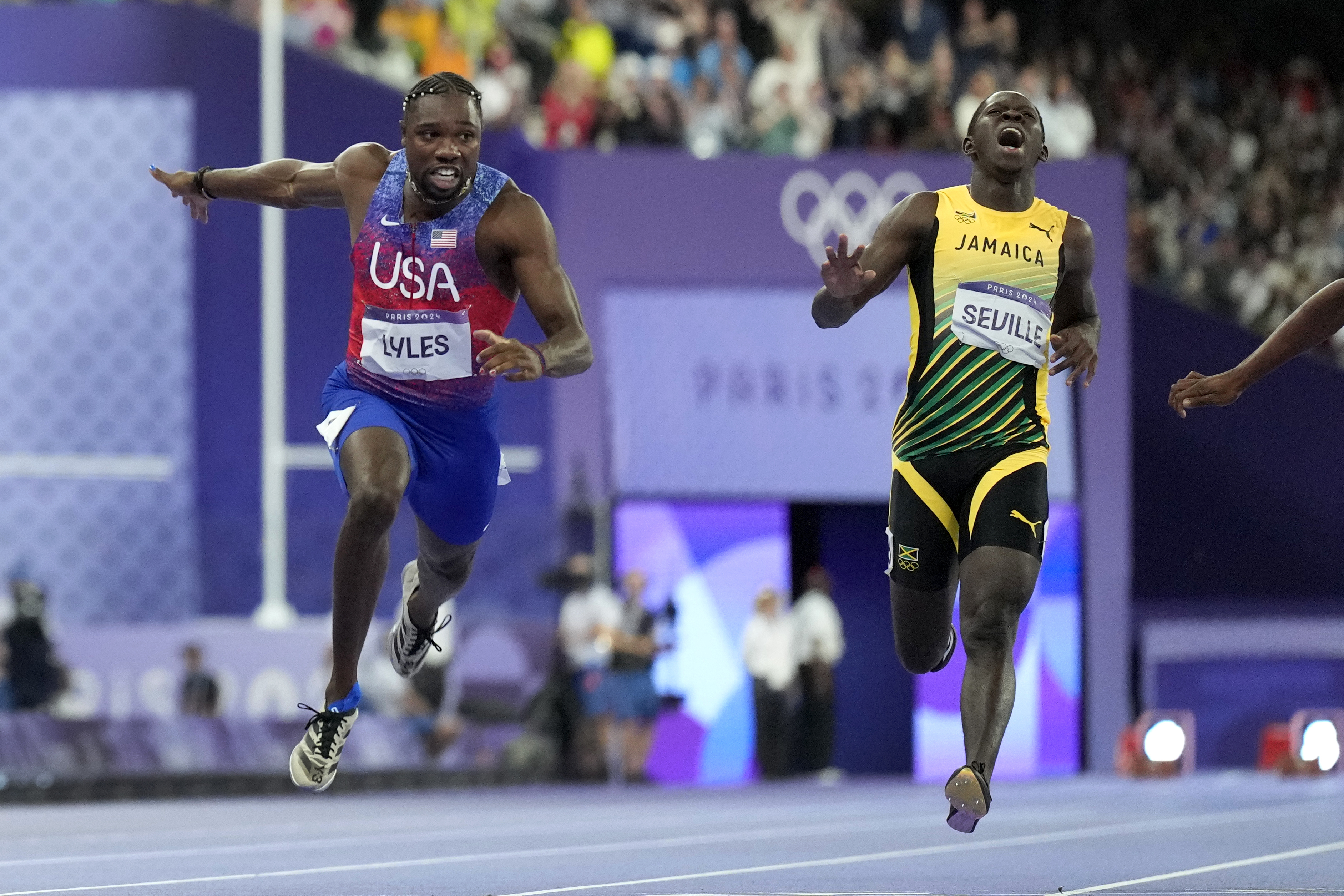 Noah Lyles wins a historically close Olympic 100-meter sprint by